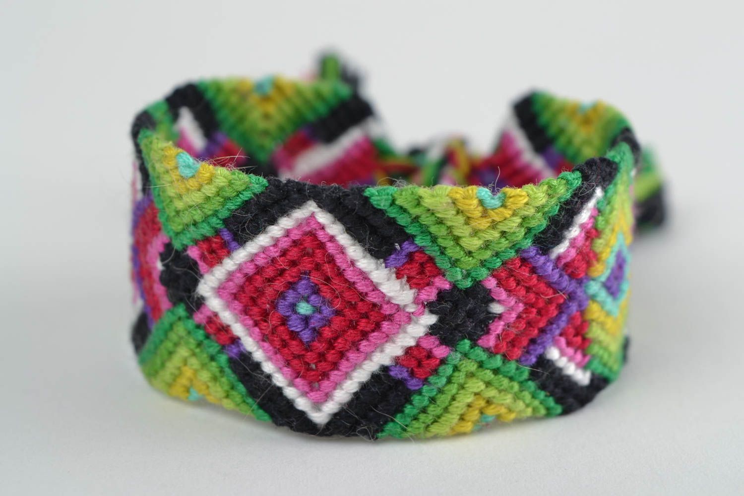 Handmade bright colorful friendship wrist bracelet woven of embroidery floss photo 3