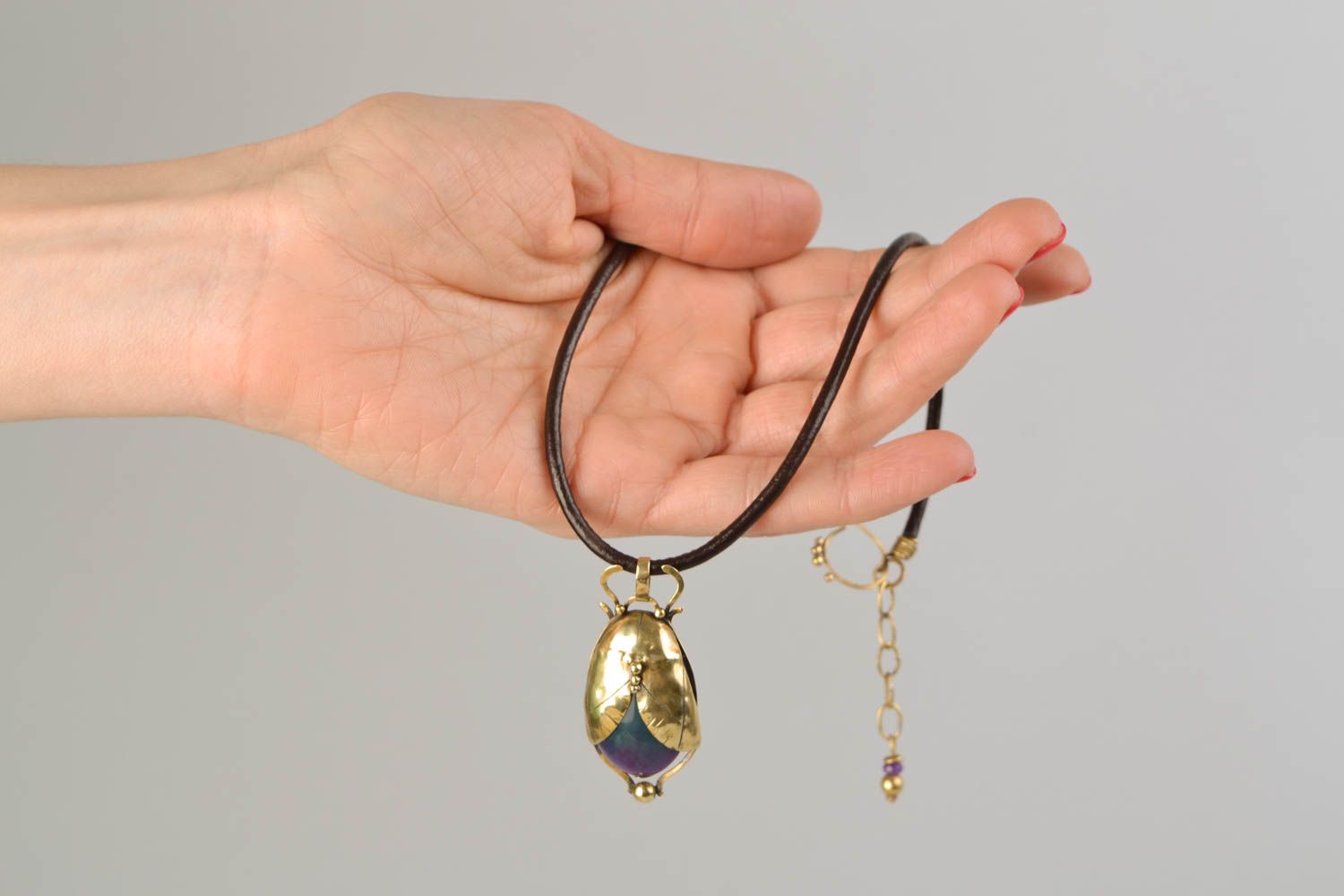Latten pendant with agate and cord photo 2