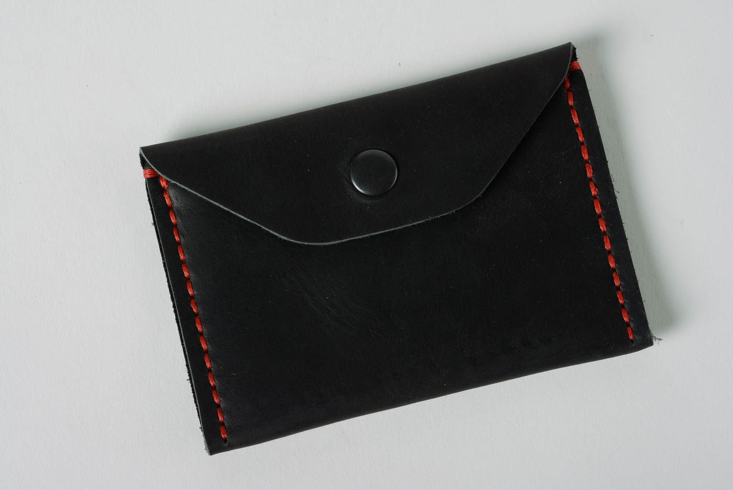 Handmade designer small coin wallet sewn of genuine black leather for women photo 1