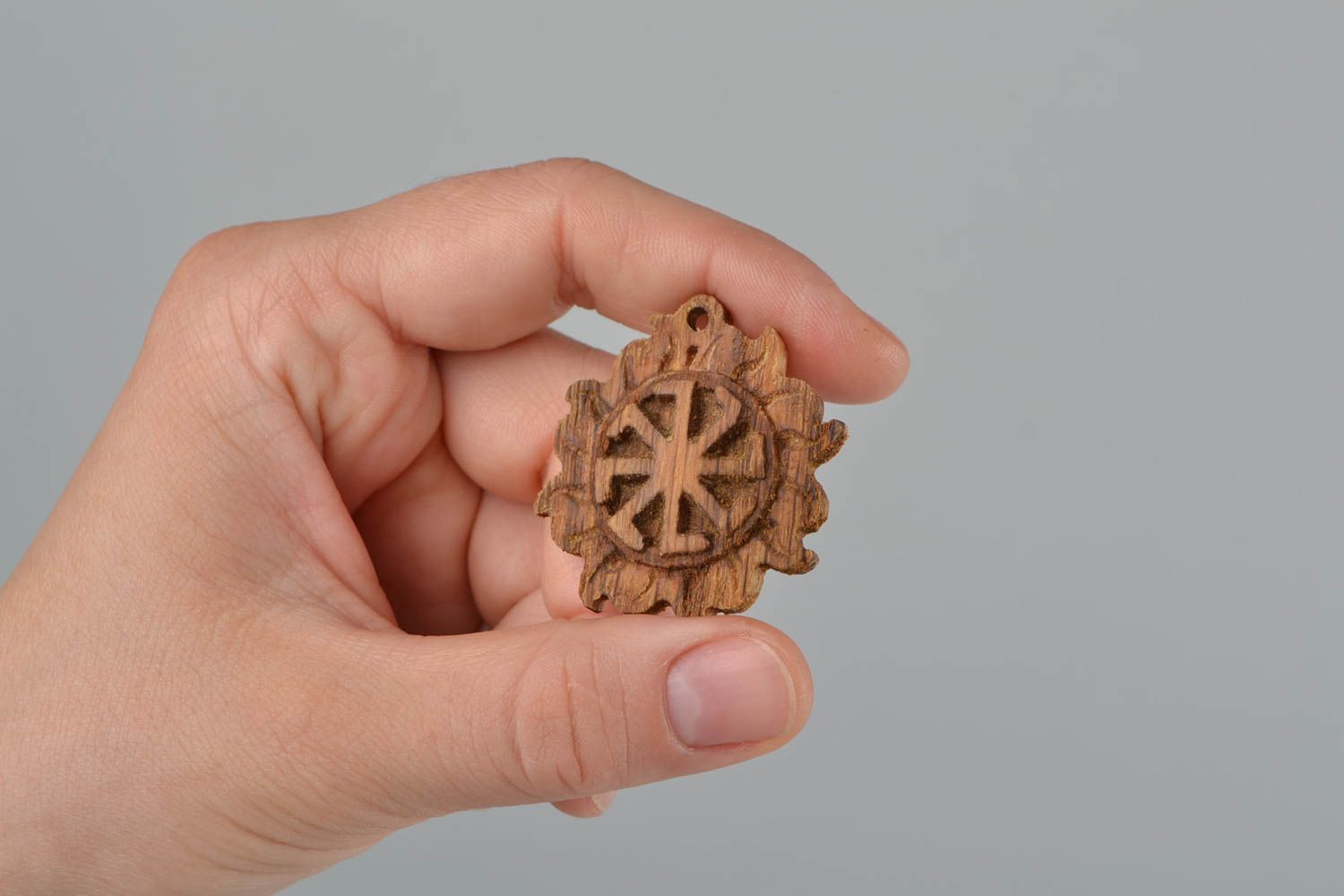 Slavonic handmade round pendant amulet made of wood Kolovrat in the Sun photo 2