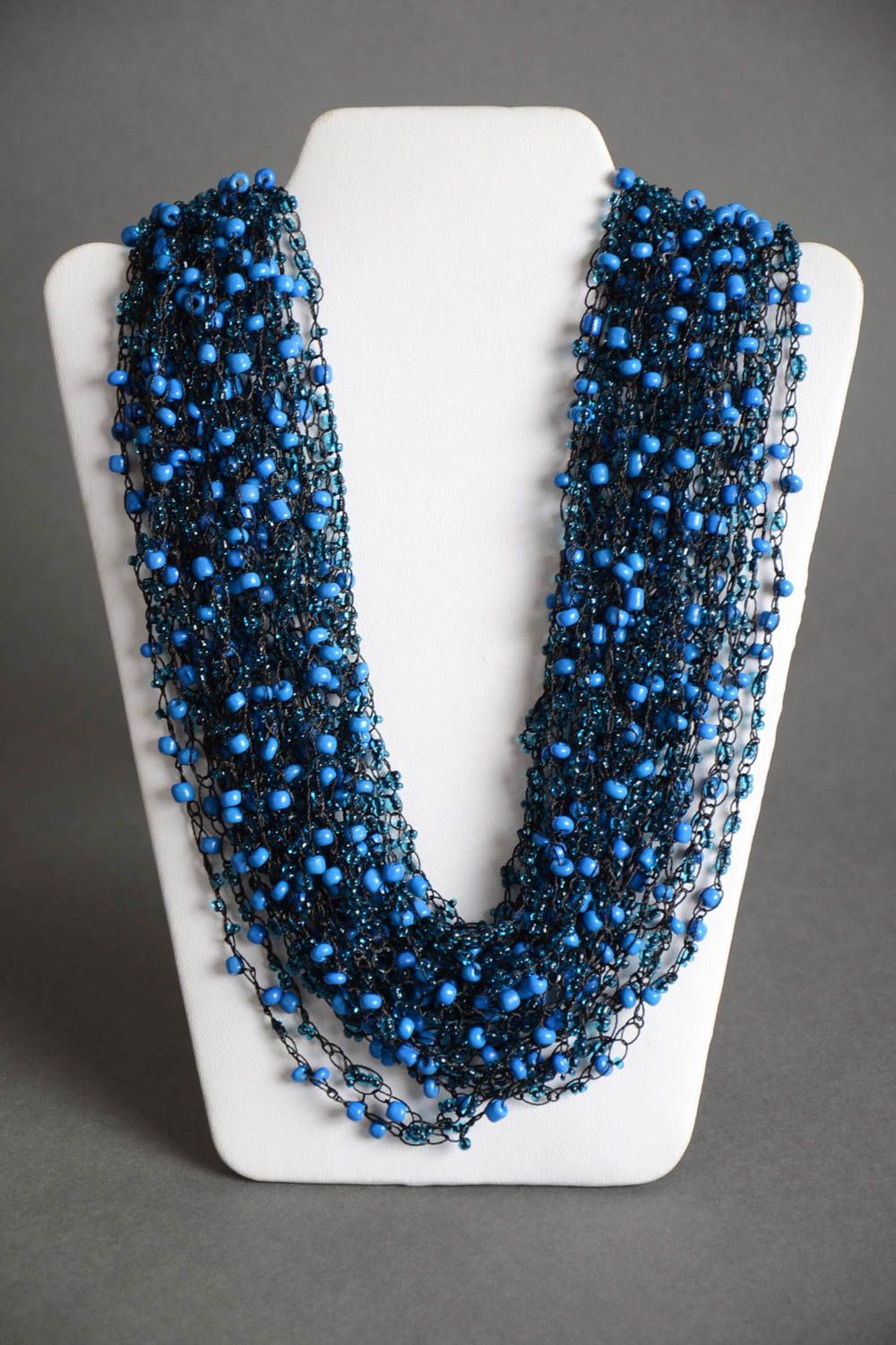 Handmade massive volume necklace crocheted of beads in dark blue color palette photo 2