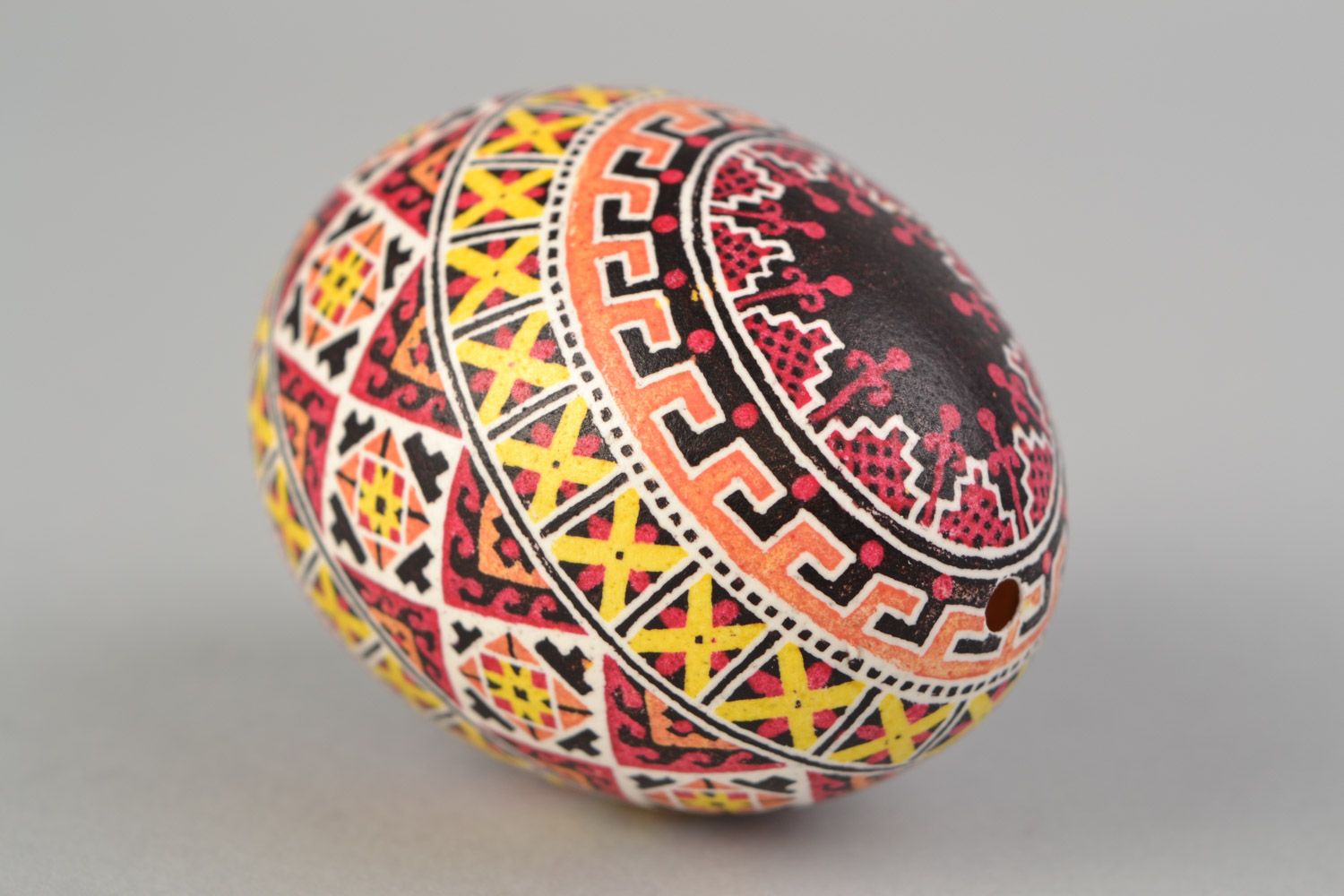 Handmade decorative Easter egg painted with wax Swastika photo 3
