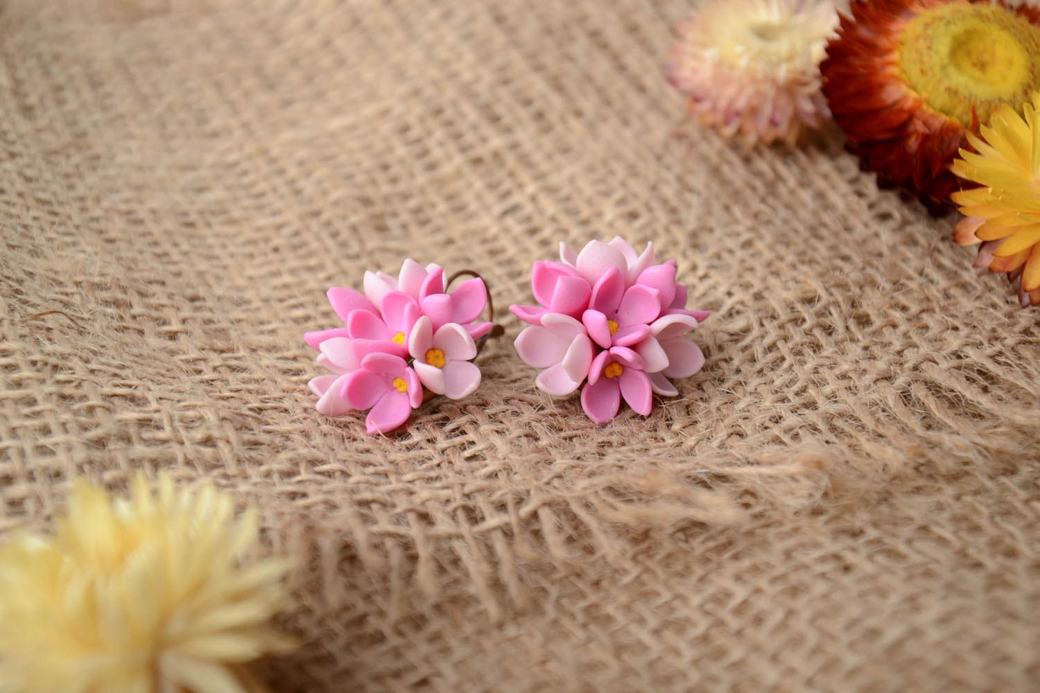 Handmade small festive earrings with tender pink cold porcelain lilac flowers photo 1
