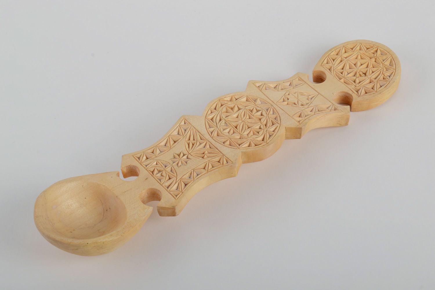 Large handmade carved wooden spoon with ornament in ethnic style for wall decor photo 2