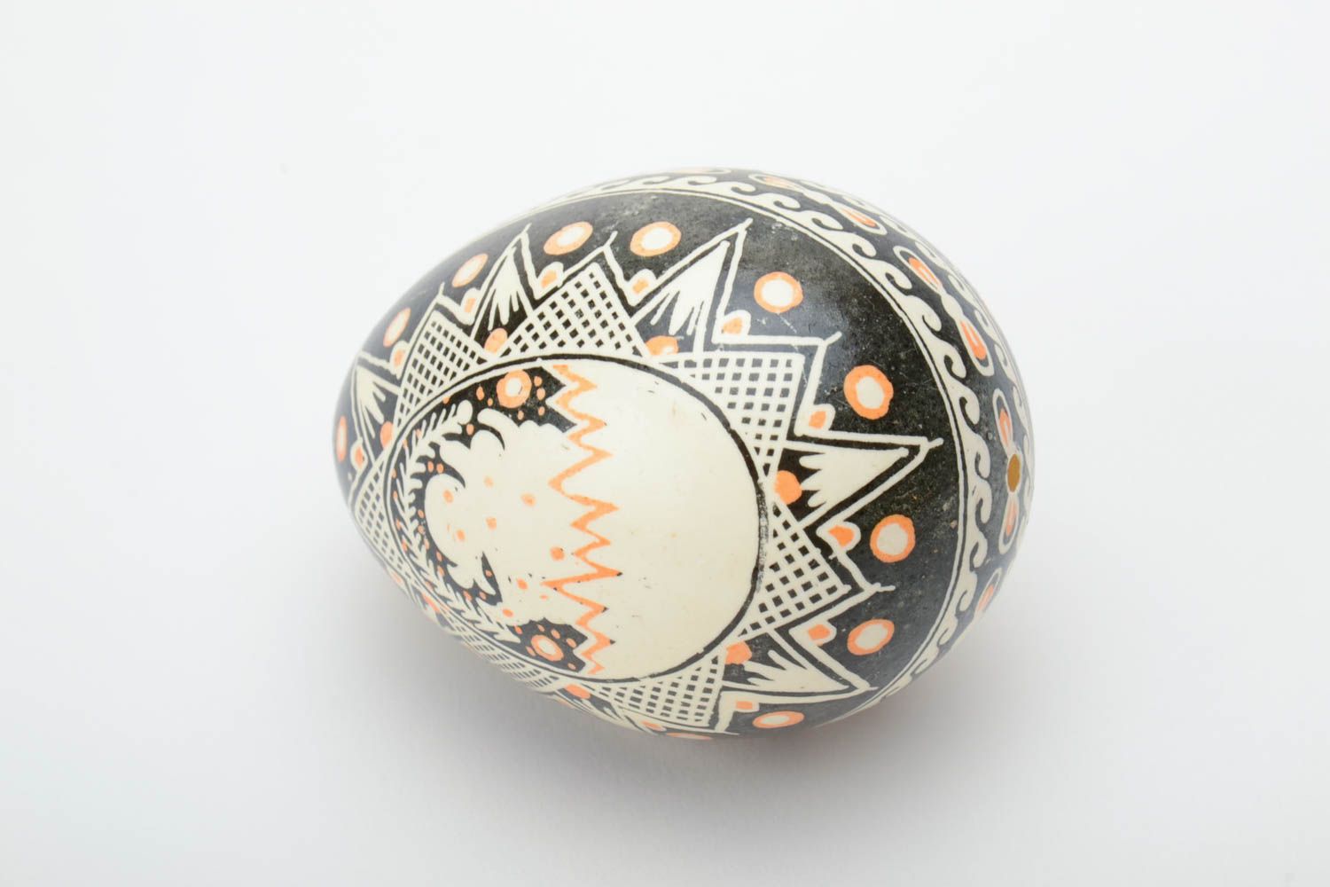 Handmade decorative souvenir Easter egg painted in black and beige colors  photo 2