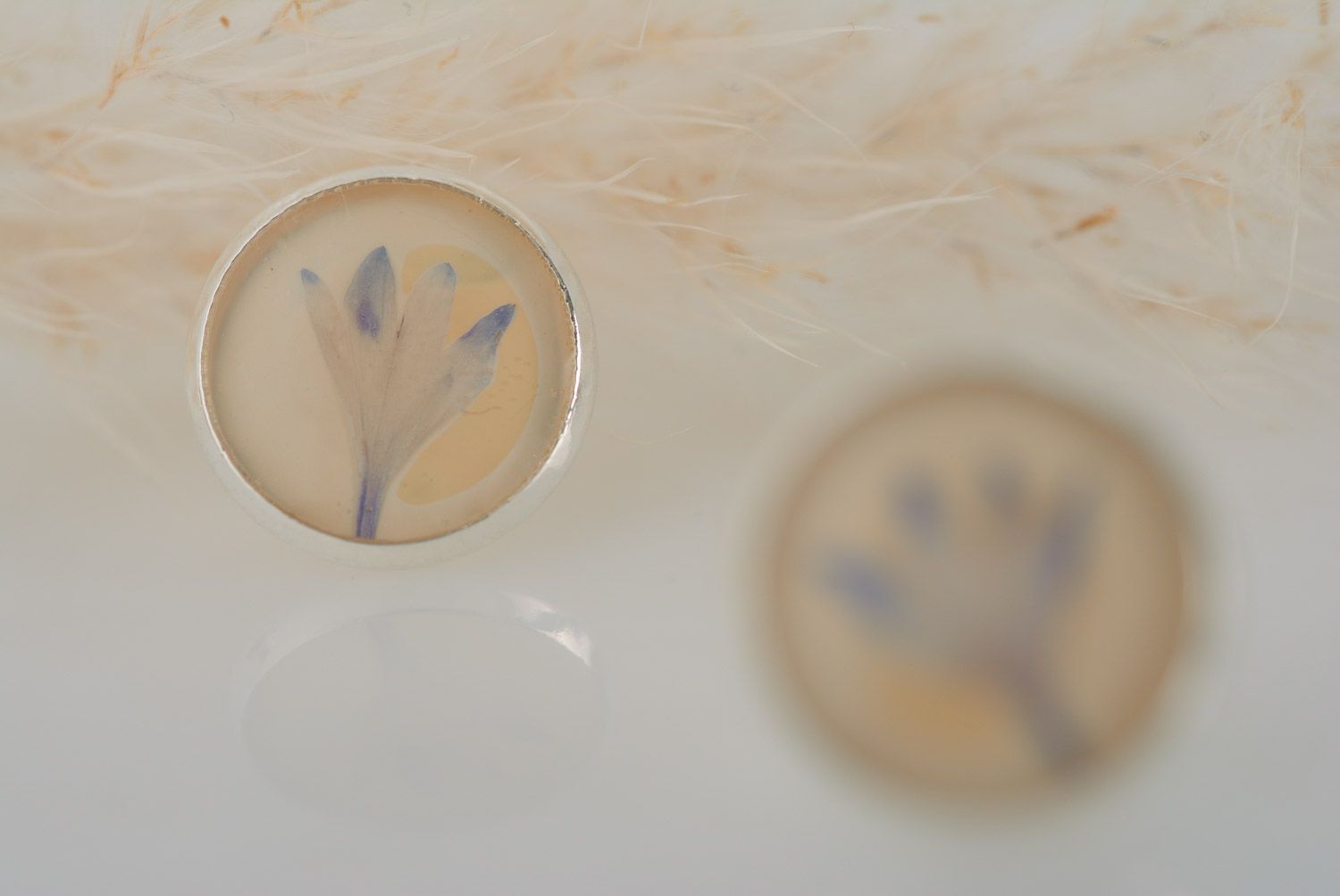 Handmade round stud earrings with natural blue flowers in epoxy resin  photo 3