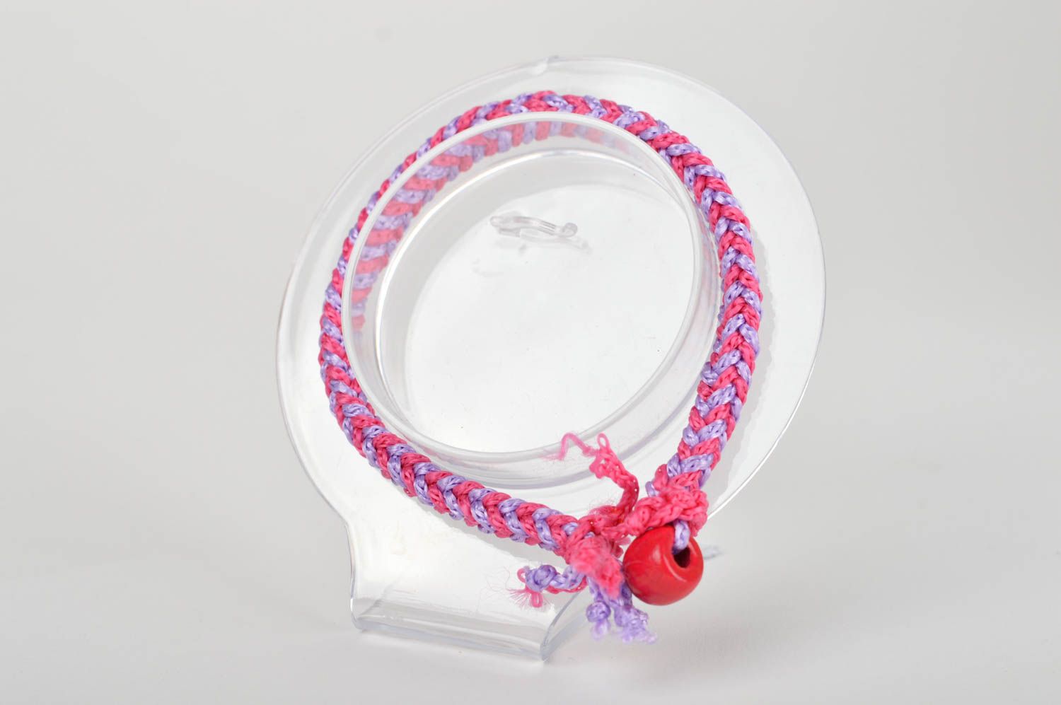 Bracelet textile Bijou fait main rose-violet tressé Accessoire femme design photo 2