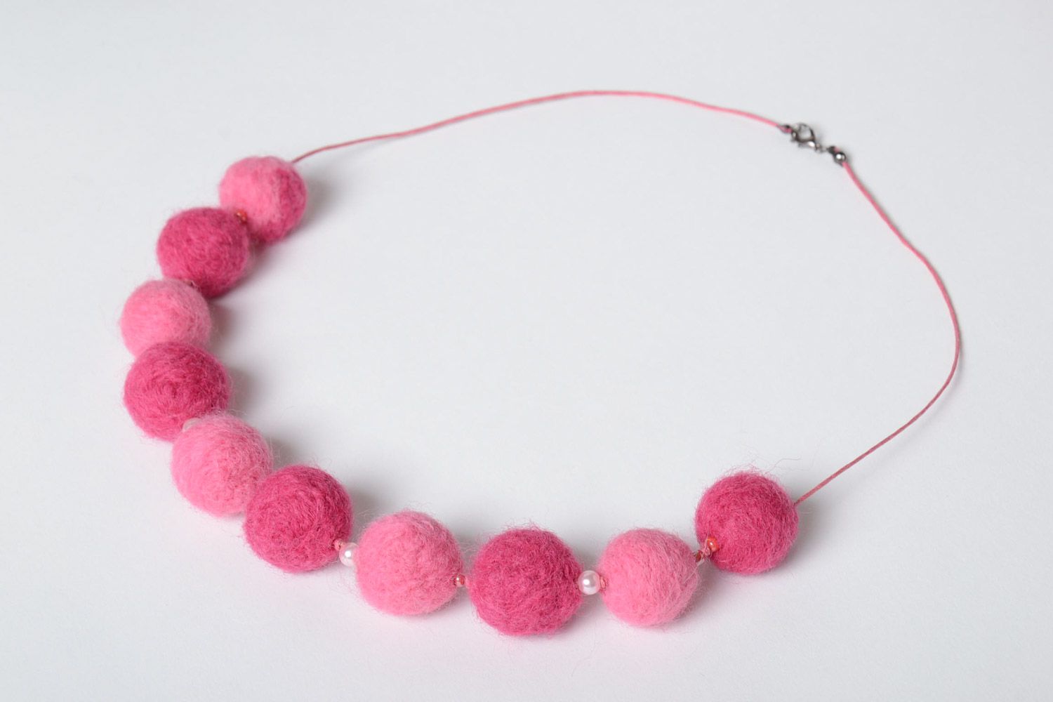 Beautiful pink soft wool ball necklace created using wet felting technique photo 2