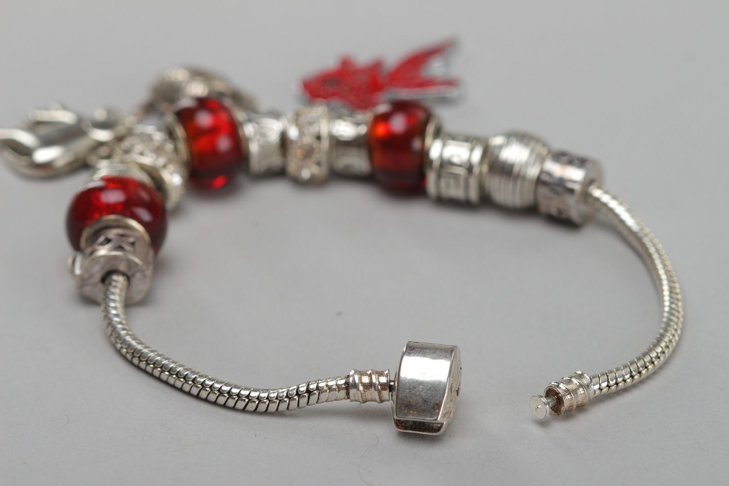Beautiful handmade wrist metal bracelet with glass beads and charms for girls photo 5