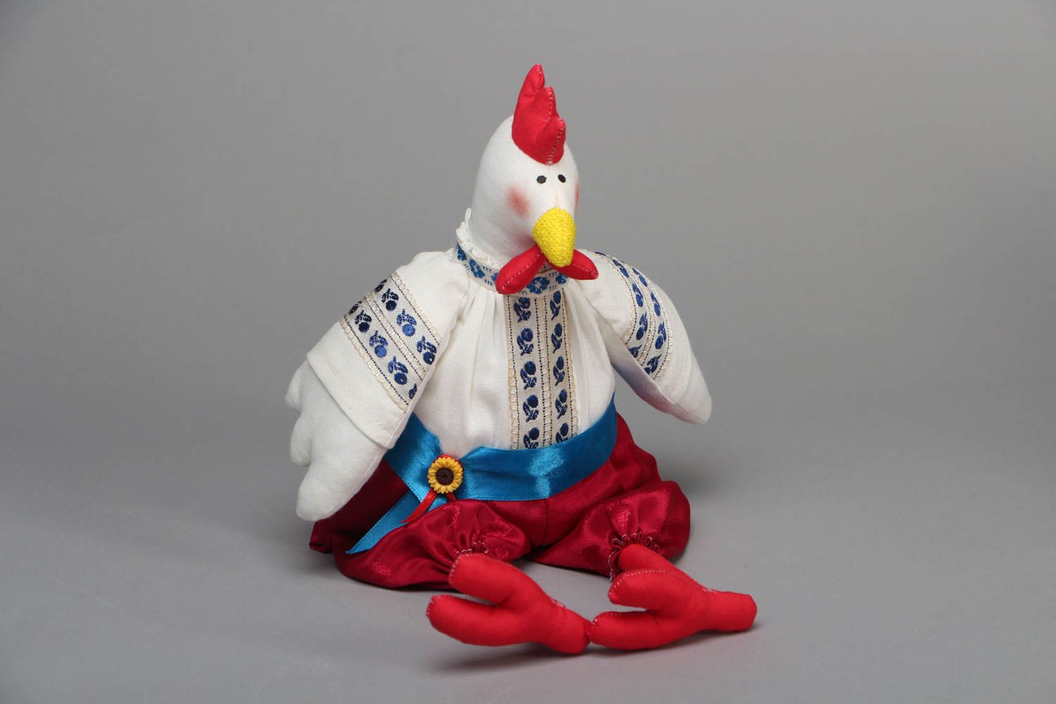 Jouet décoratif en costume national Coq photo 1