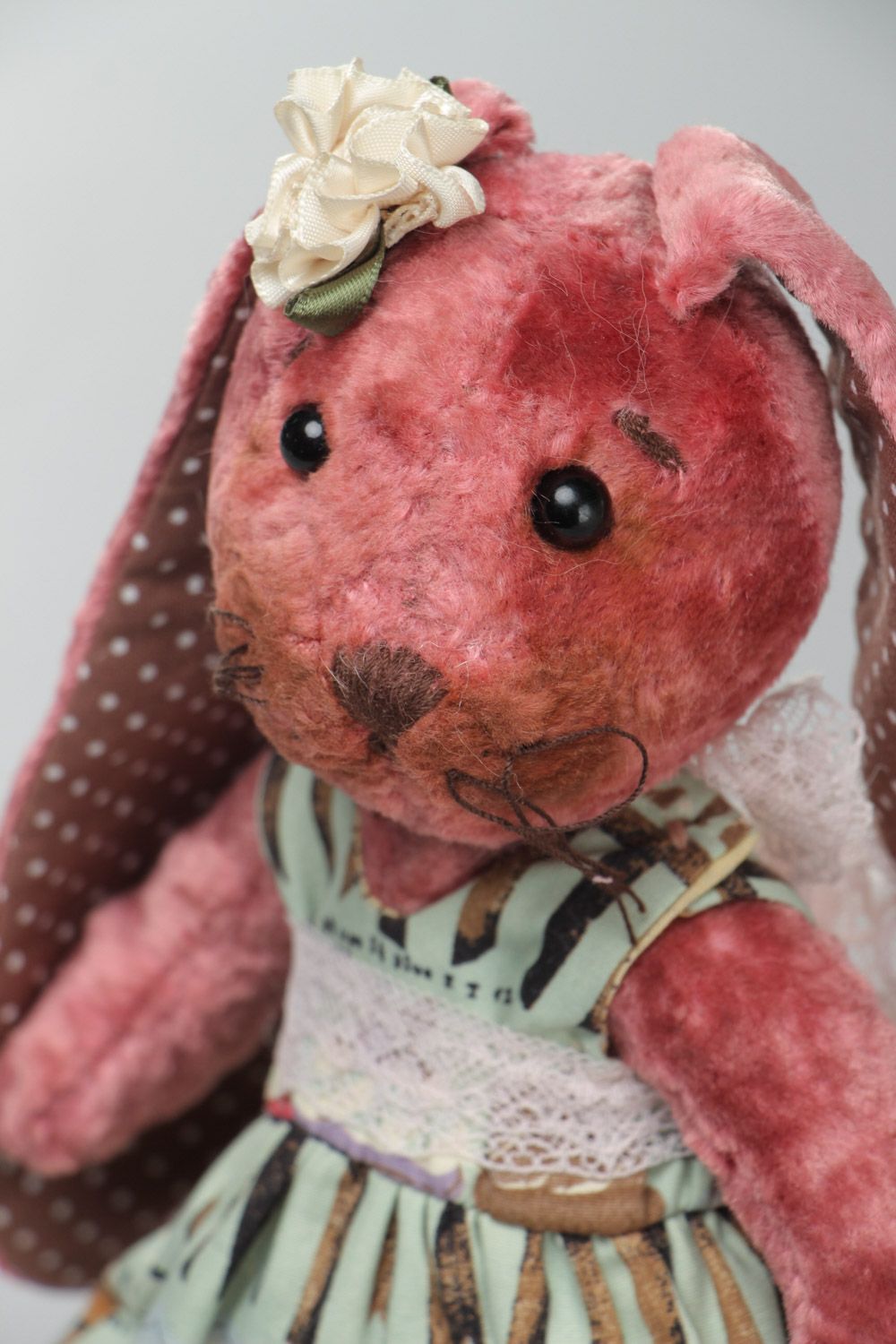 Handmade vintage soft toy sewn of red plush in the shape of cute rabbit photo 3