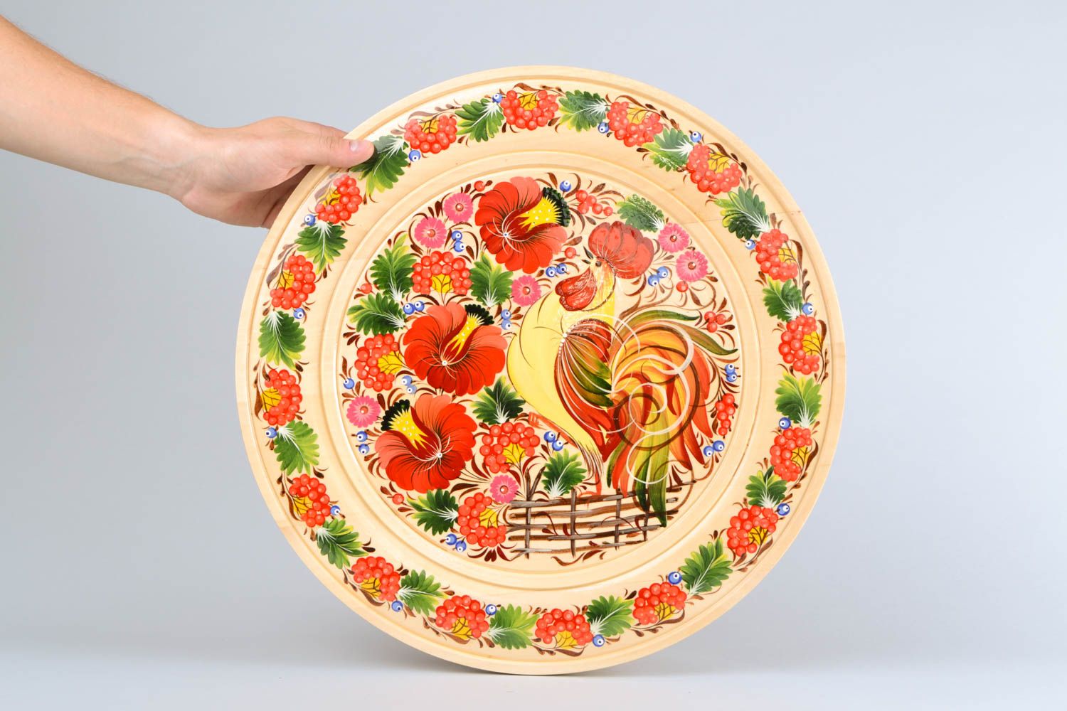 Handgemachter Teller aus Holz mit Ölfarben in Petrykivsk Stil bemalt originell foto 2