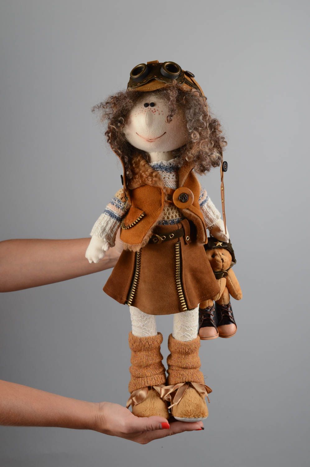 Handmade designer soft doll sewn of linen in the shape of aviator with bear  photo 5
