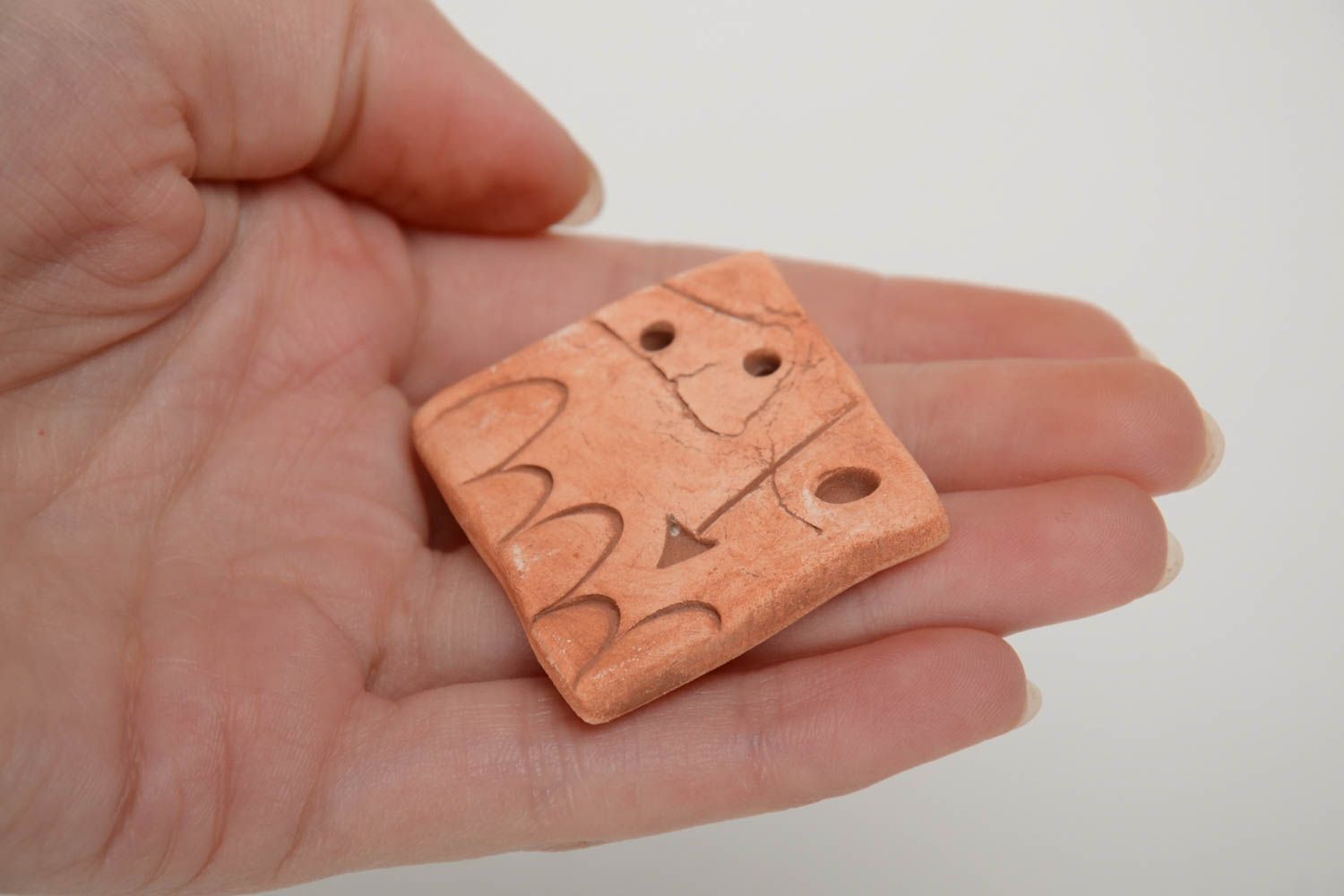 Handmade pendant molded of pottery clay with arrow pattern for creative work photo 5