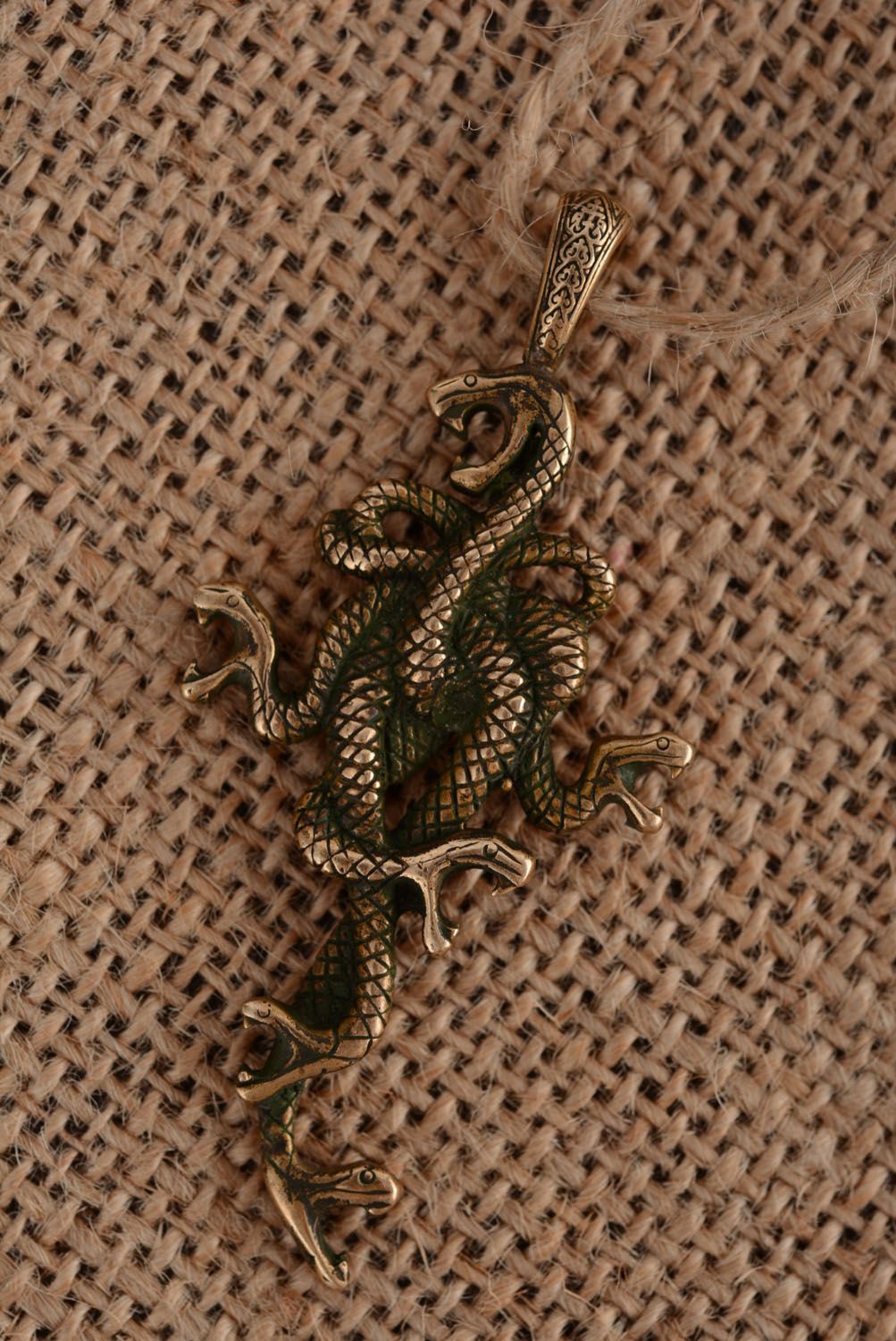 Bronze pendant Snakes photo 1