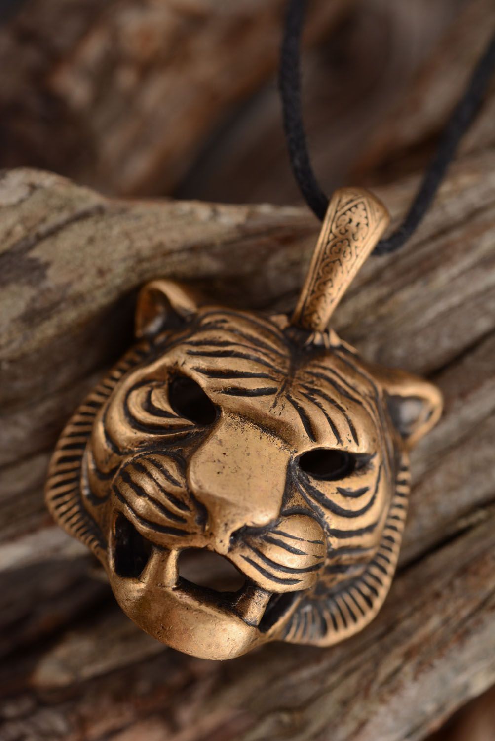 Pendentif en bronze artisanal Tête de tigre  photo 1