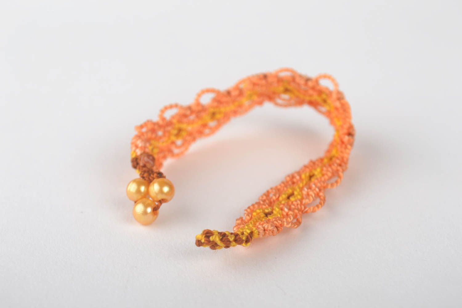 Pulsera hecha a mano de hilos anaranjada accesorios de moda bisutería artesanal foto 4