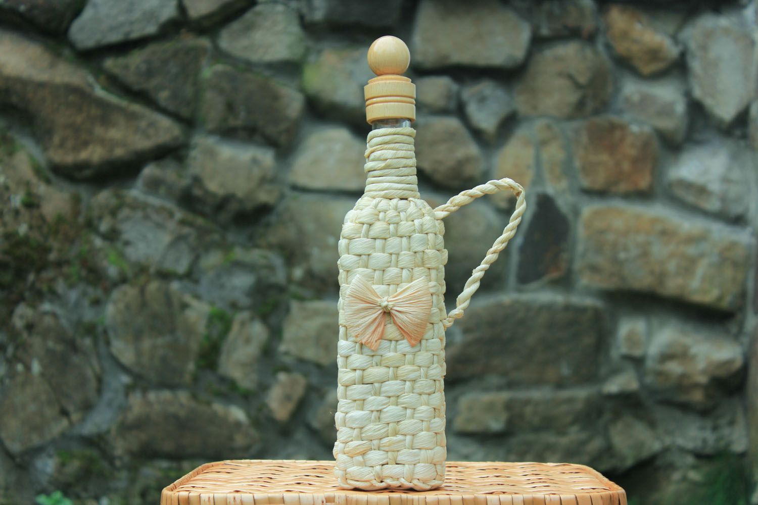 Bottle braided with corn leaves photo 1