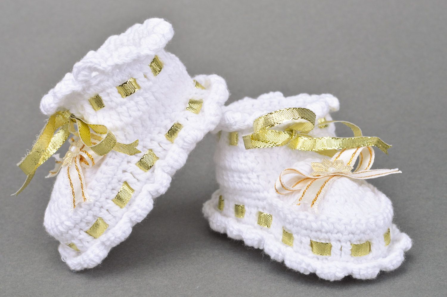 Handmade small summer white baby booties for a girl with golden ribbons photo 5
