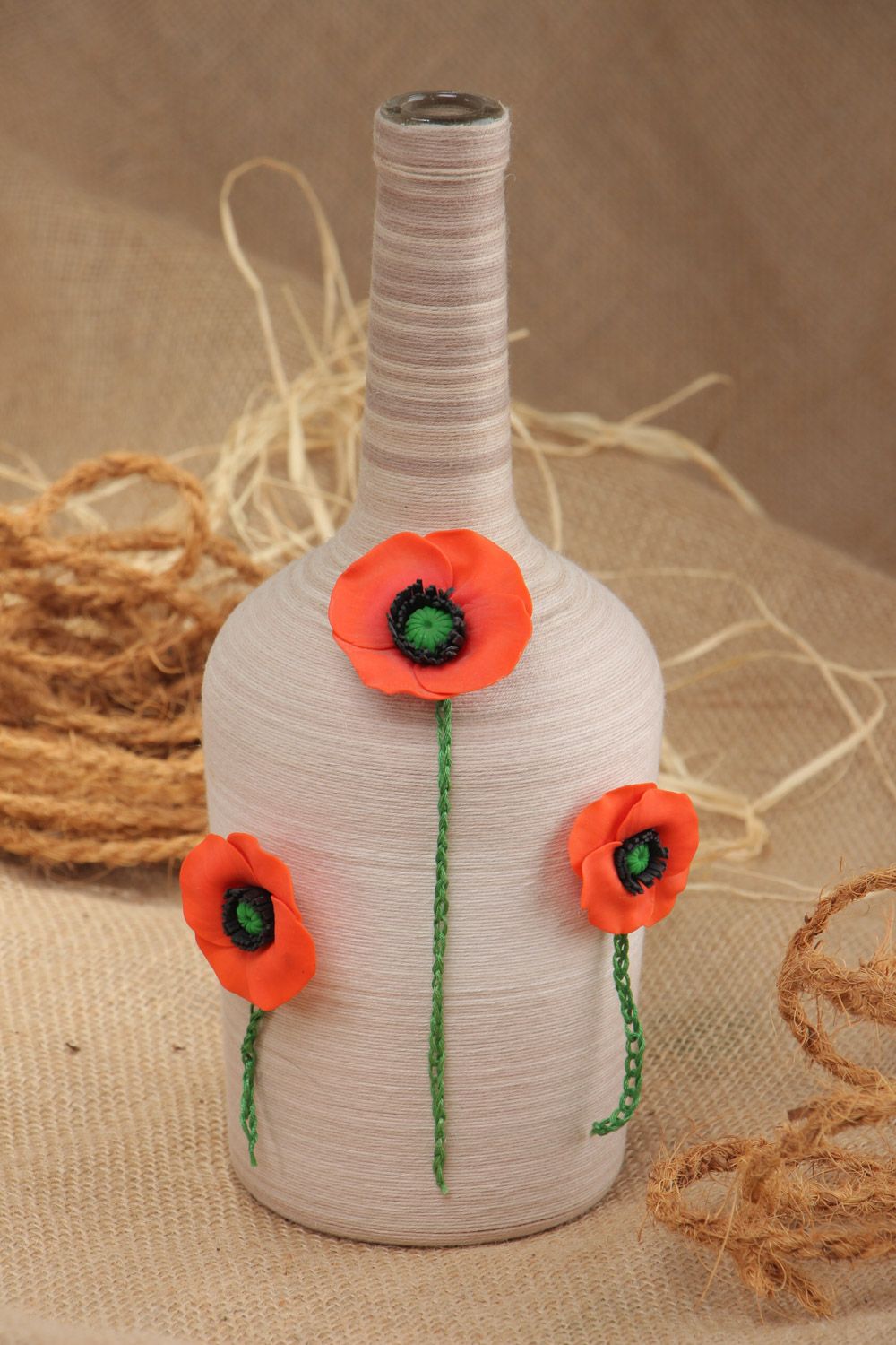 Handmade glass bottle woven over with cotton threads for interior decor 700 ml photo 1