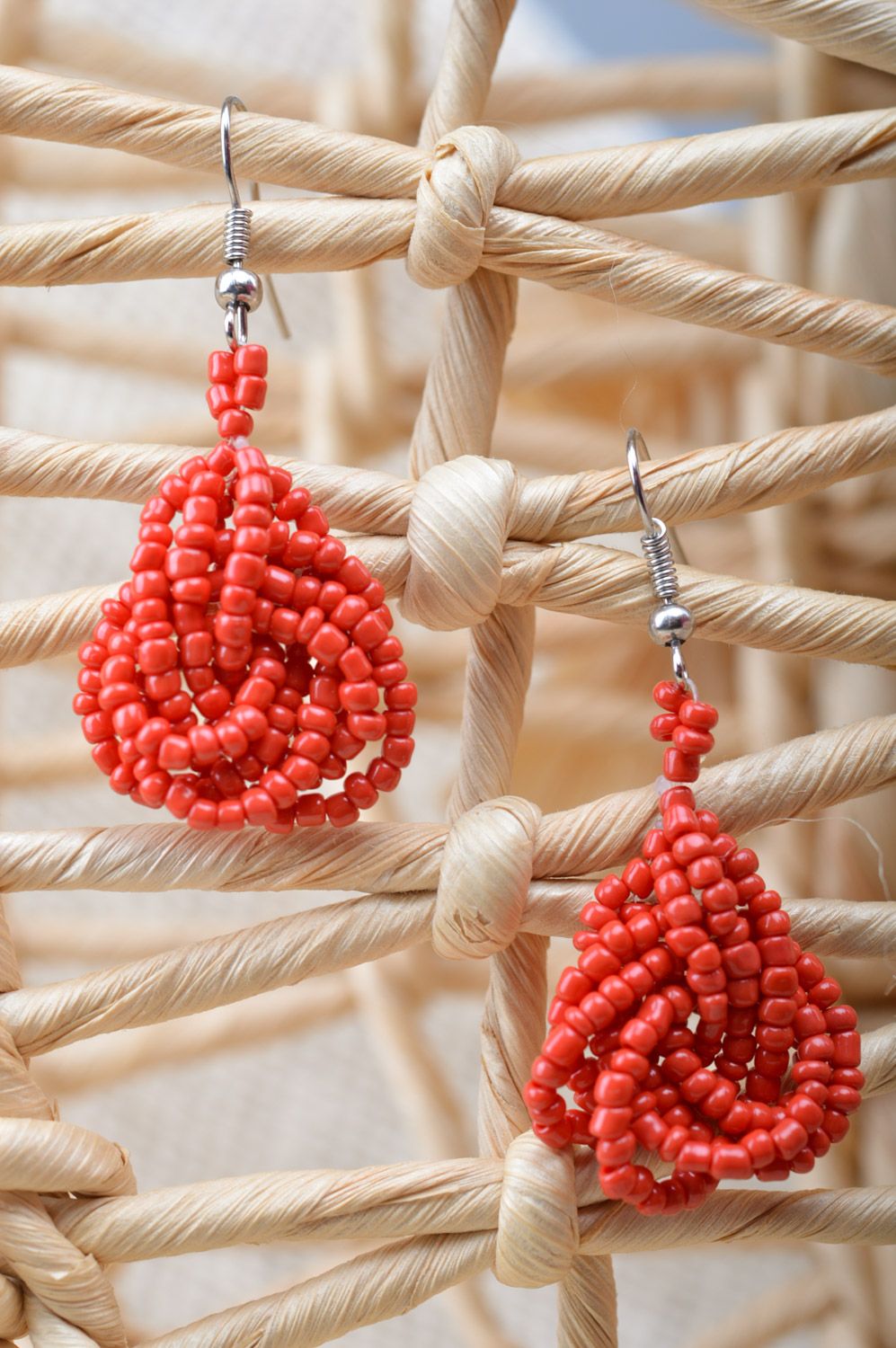 Handmade festive dangle earrings woven of Czech beads of red color photo 5