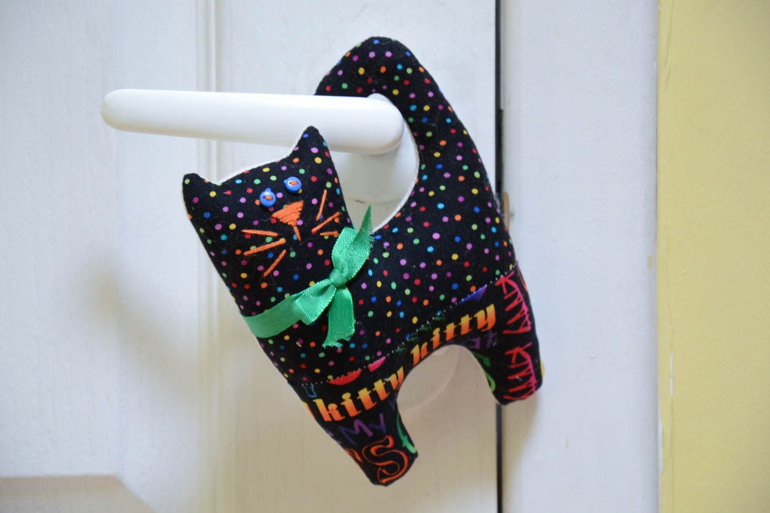 Handmade designer hanging cotton fabric soft toy black cat with green bow photo 1
