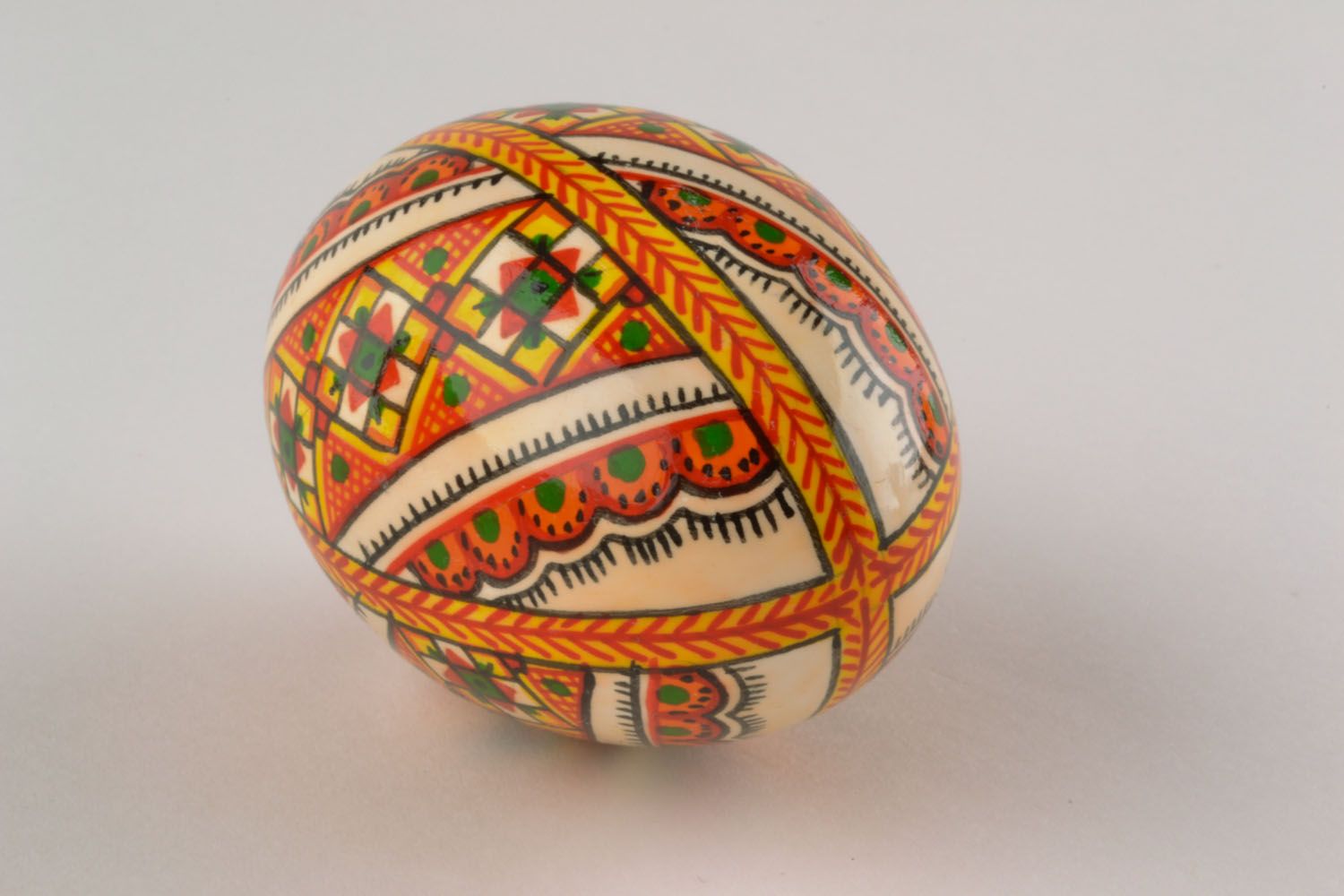 Wooden egg with ethnic painting photo 5