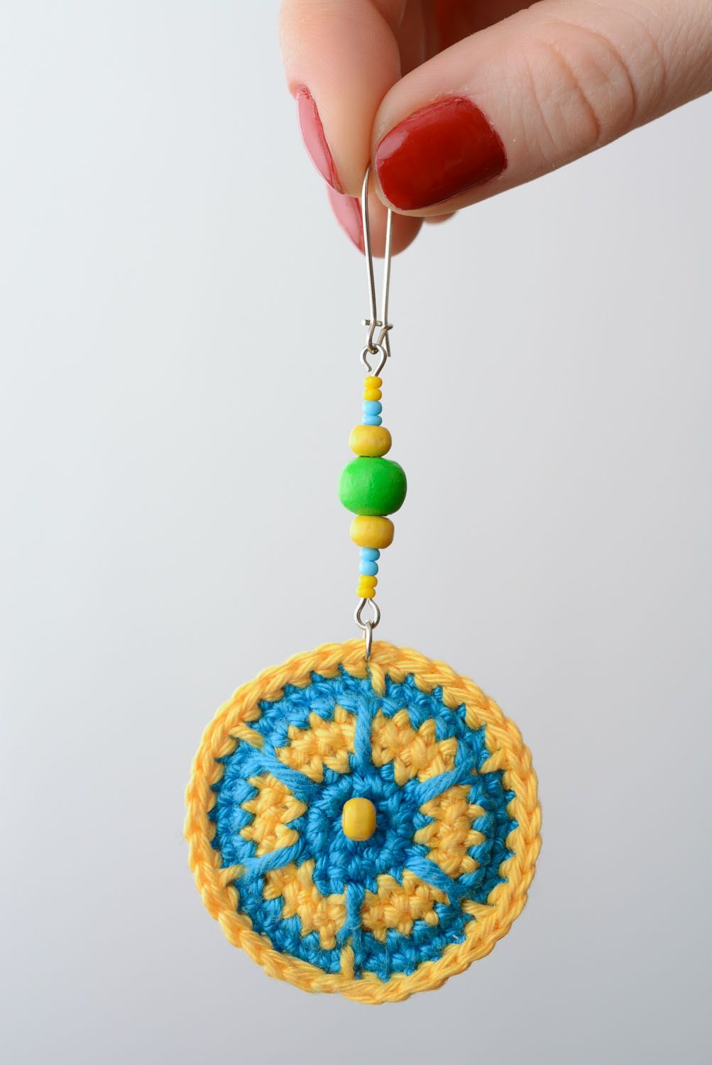 Crocheted round earrings photo 4