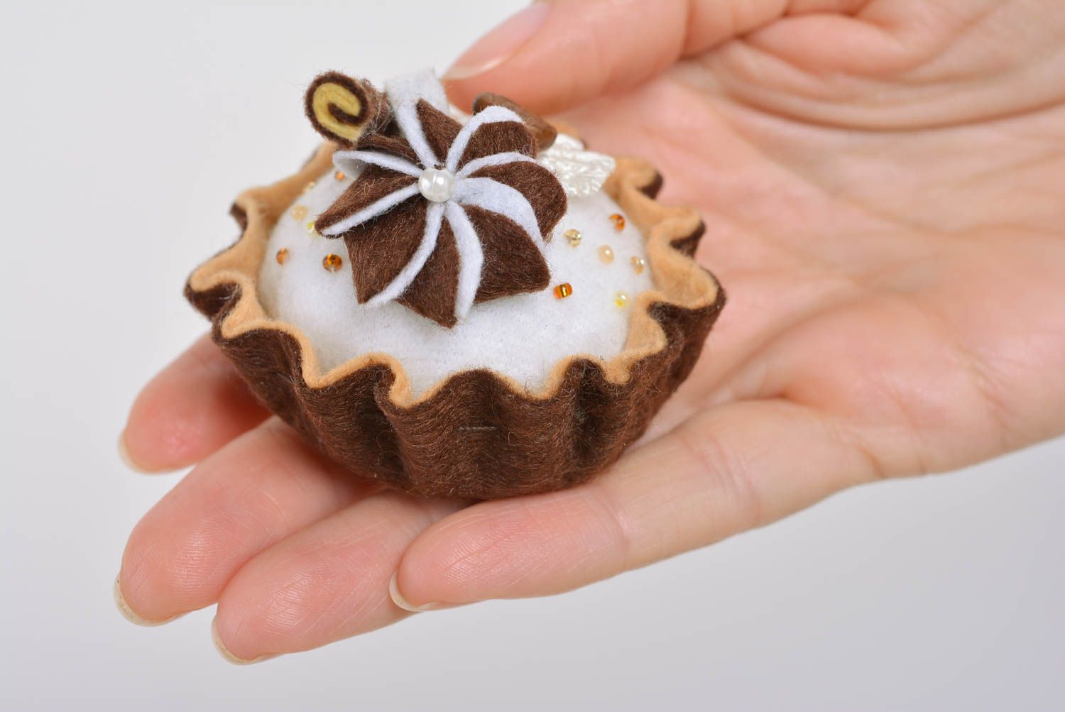 Handmade soft pincushion sewn of felt in the shape of chocolate cake with coffee photo 5