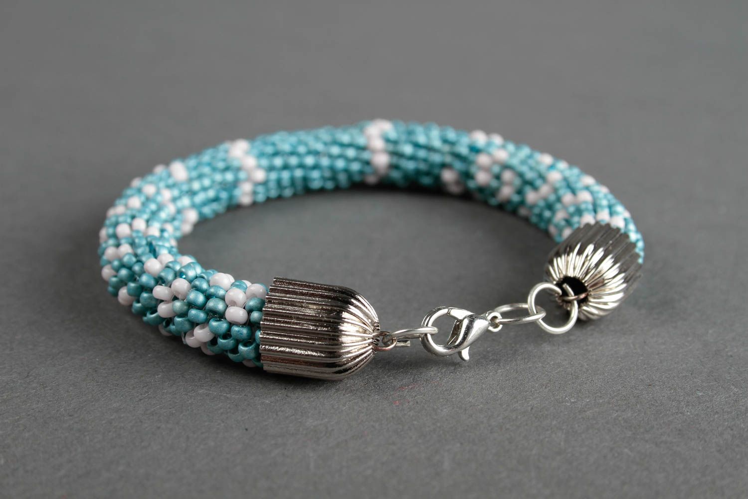 Handmade beaded cord bracelet in turquoise and white beads photo 4