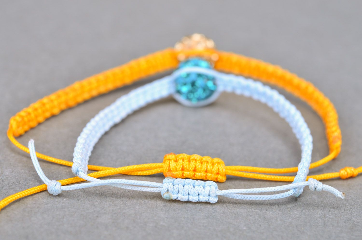 Set of 2 handmade friendship wrist bracelets of yellow and blue colors with beads photo 5