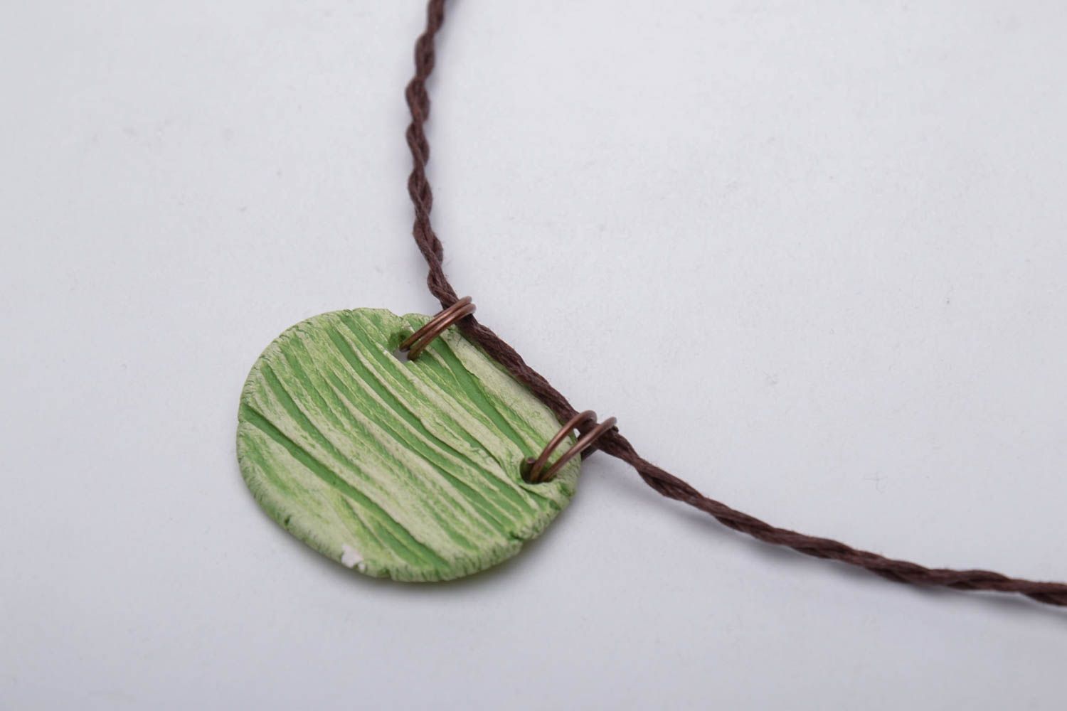 Clay pendant with cord photo 4