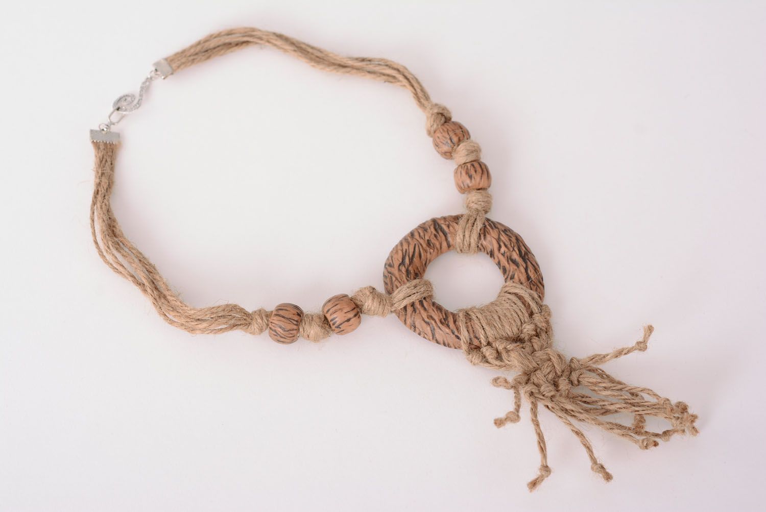 Woven necklace with plastic beads photo 3