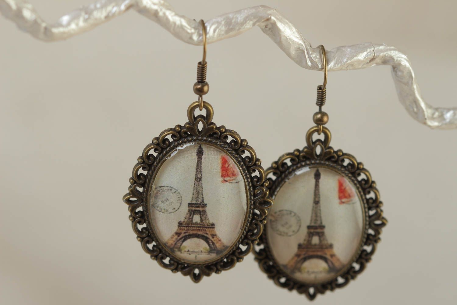 Egg-shaped vintage handmade earrings made of glass glaze with a picture of Eiffel tower photo 1