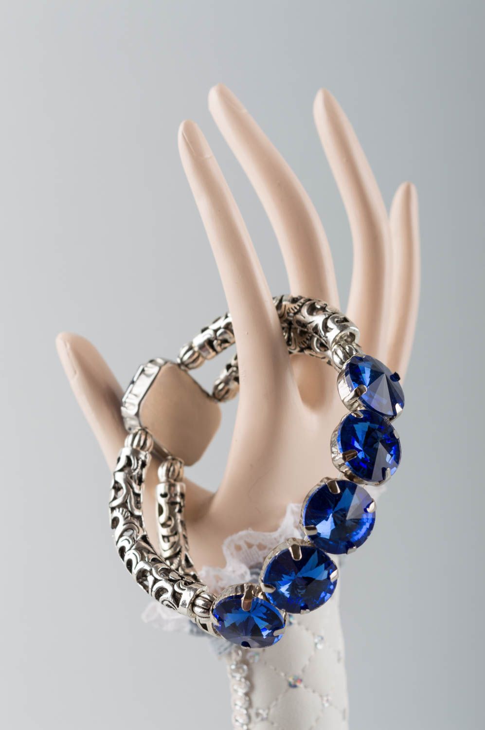 Women's handmade designer metal wrist bracelet with large blue strasses photo 1