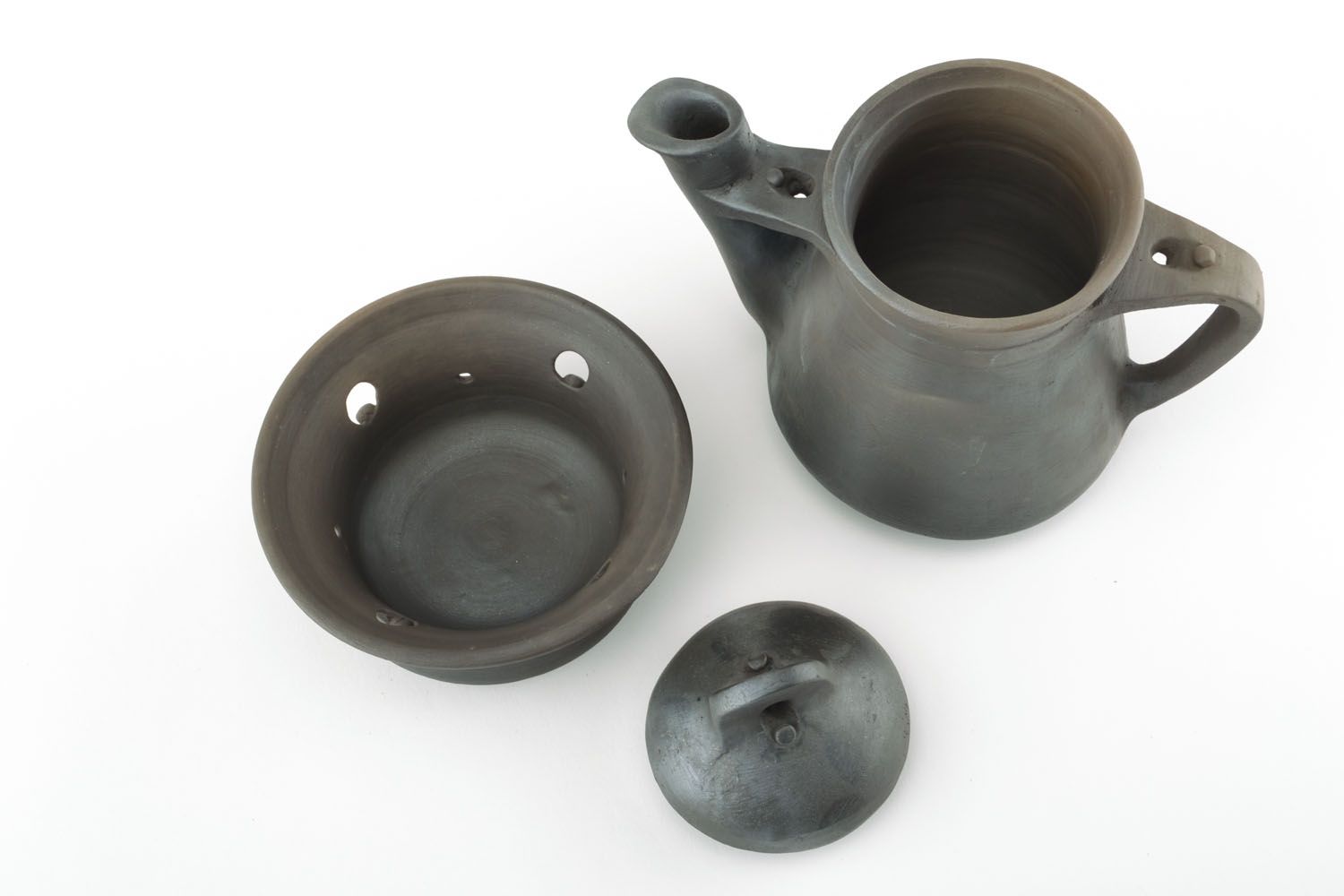 Schwarze Teekanne aus Keramik foto 3