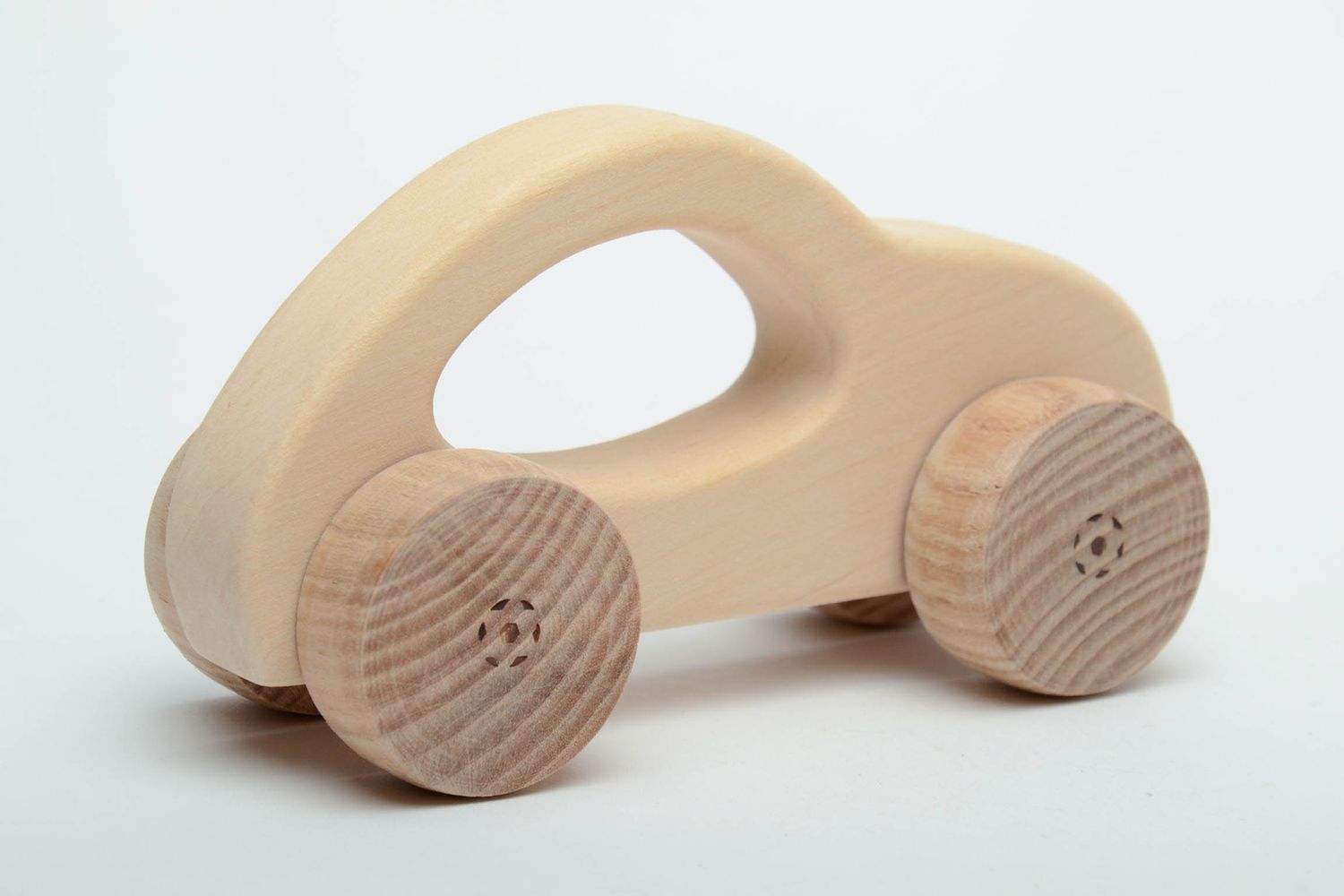 Wooden wheeled toy car photo 3