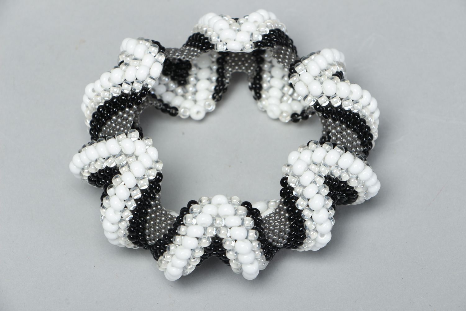 Handmade black and white beads bracelet on elastic cord photo 2