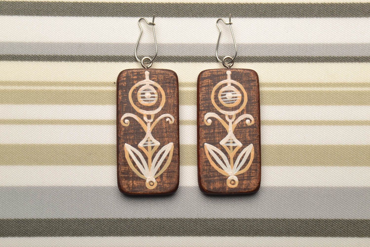 Wooden earrings with painting photo 1