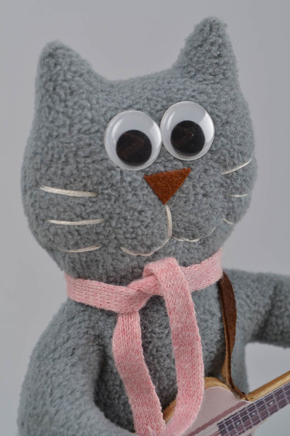 Handmade small designer soft toy sewn of gray fleece Cat with guitar for kids photo 4