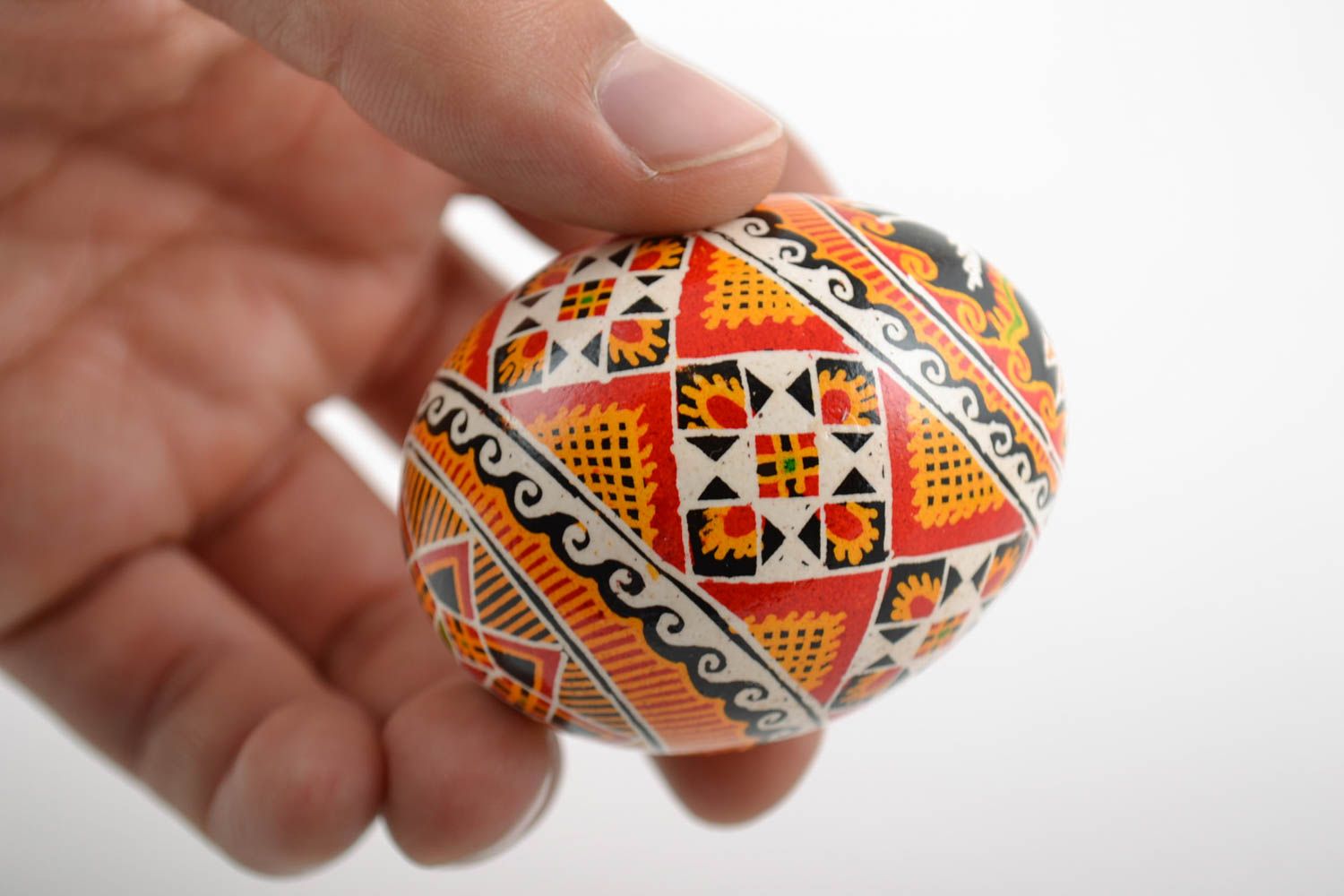 Beautiful handmade painted Easter egg with folk ornaments photo 2