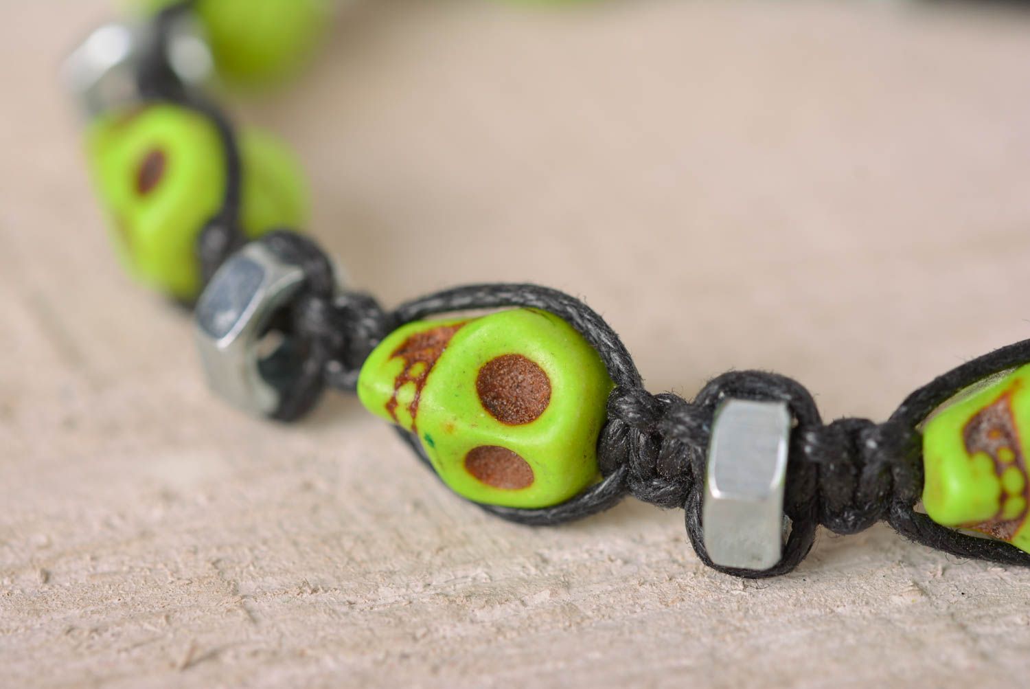 Handmade light green skull color beaded black cord bracelet with female screws photo 2