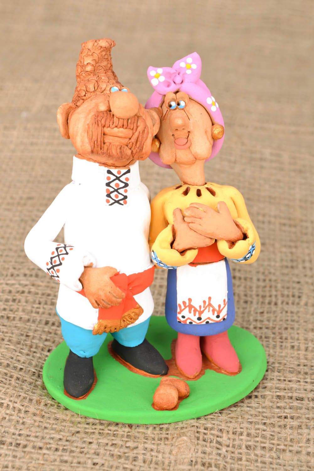 Figurine céramique 'Cosaque et sa femme bras dessous bras dessus' photo 1