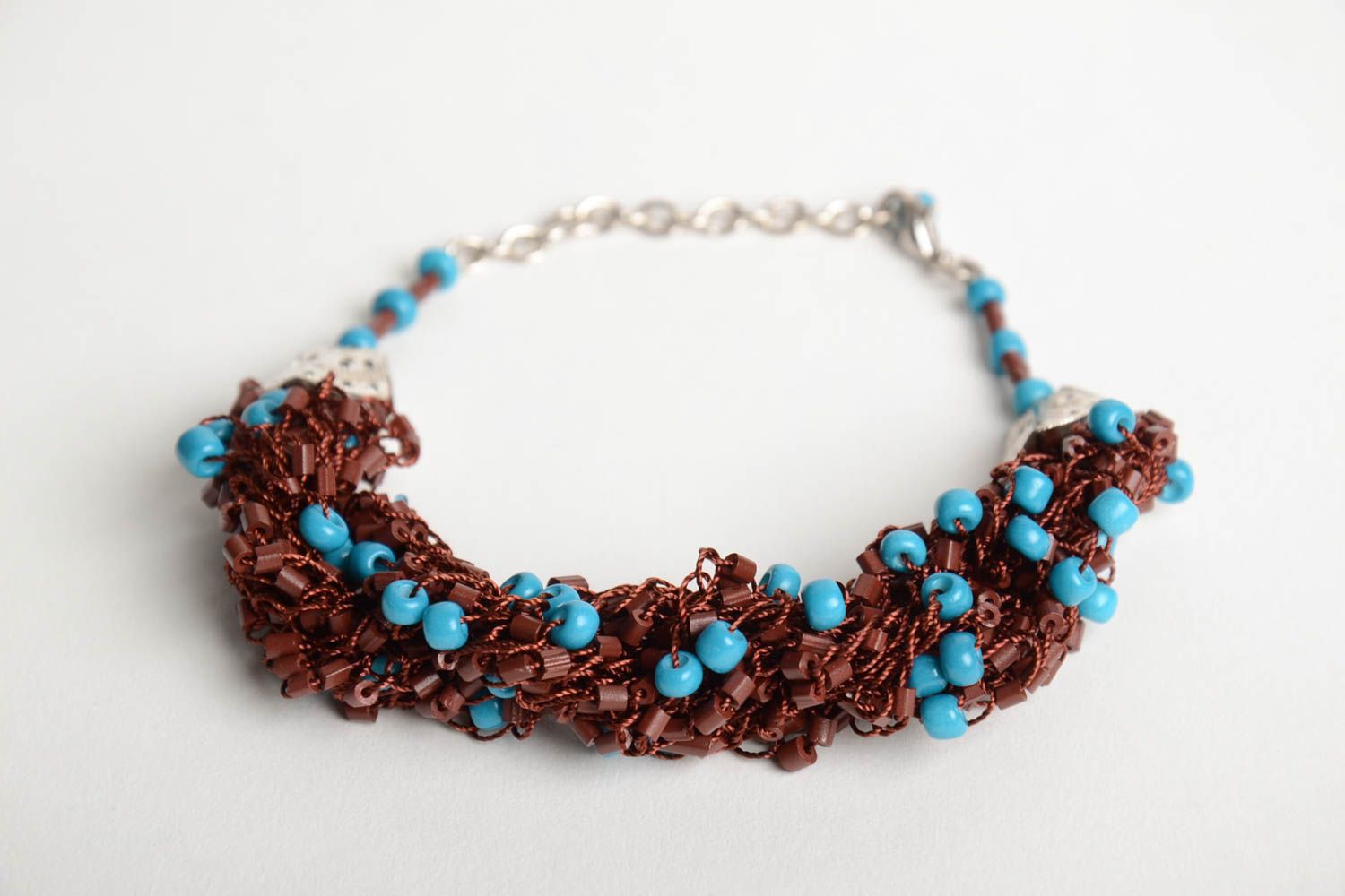 Handmade designer crocheted wrist bracelet with brown and blue Czech beads photo 3