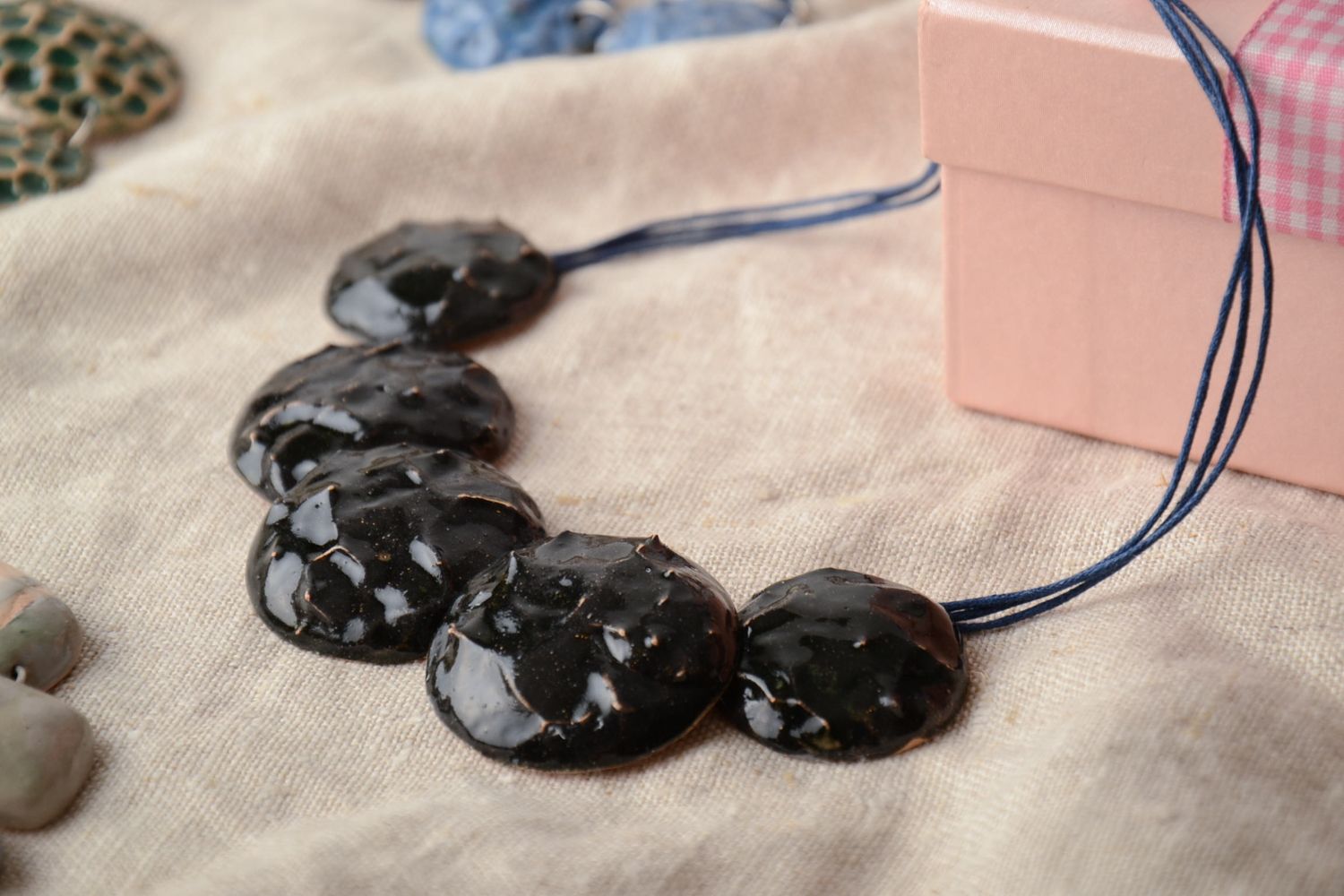 Unusual ceramic bead necklace on cord photo 1