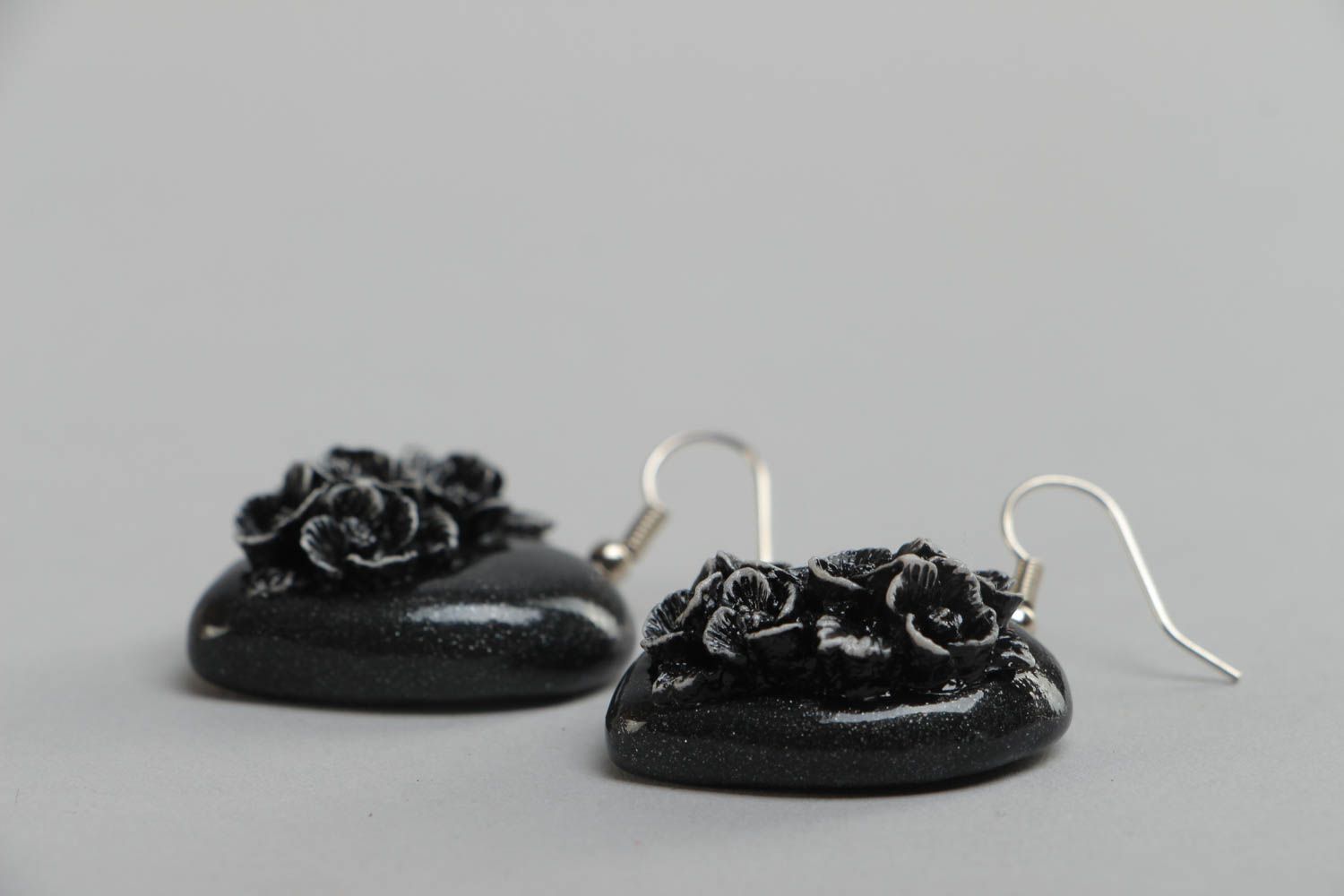 Handmade small polymer clay black heart shaped dangling earrings with flowers photo 3
