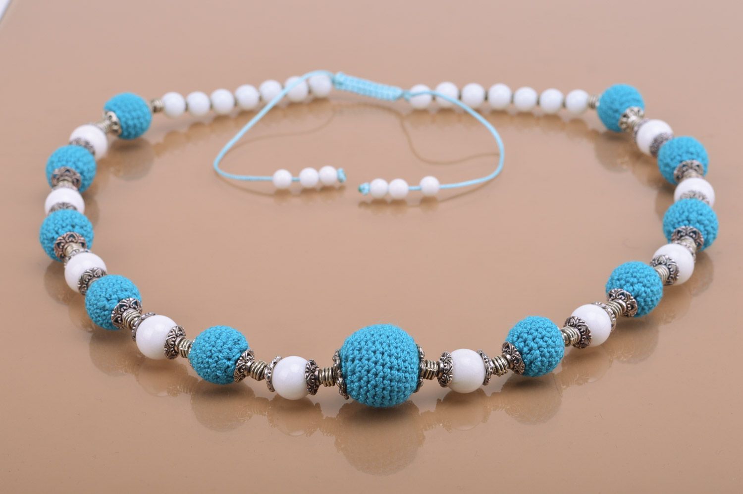 Handmade designer women's white and blue necklace with crochet over beads photo 5