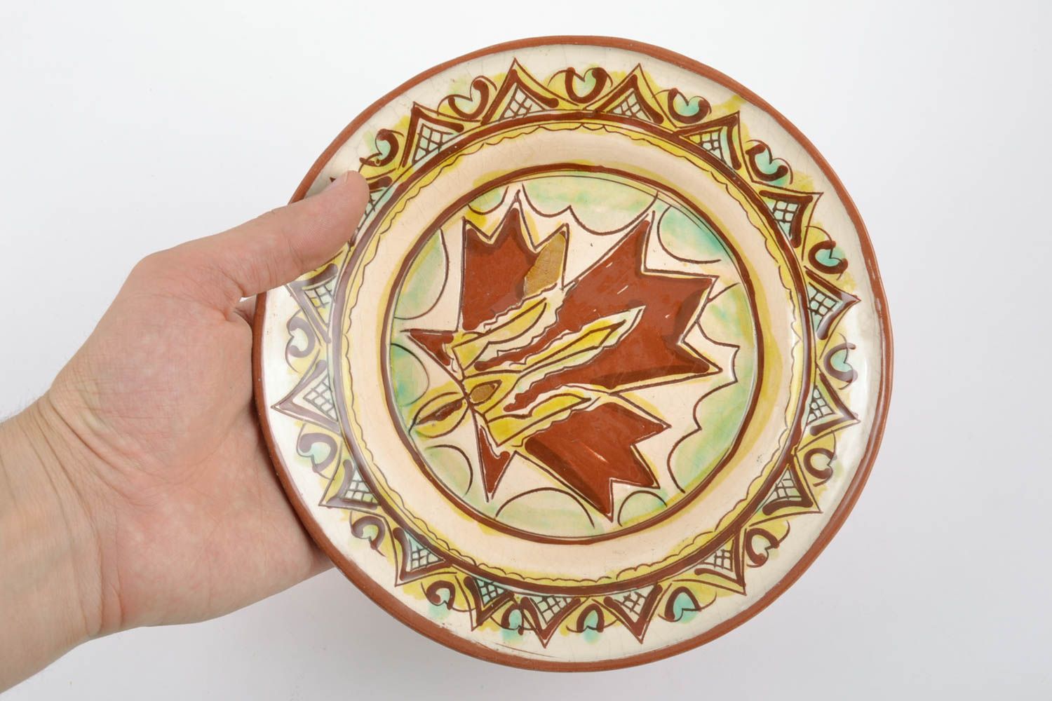 Schöner handmade Deko Teller aus Keramik mit Glasur bemalt mit Ethnomuster grell foto 2
