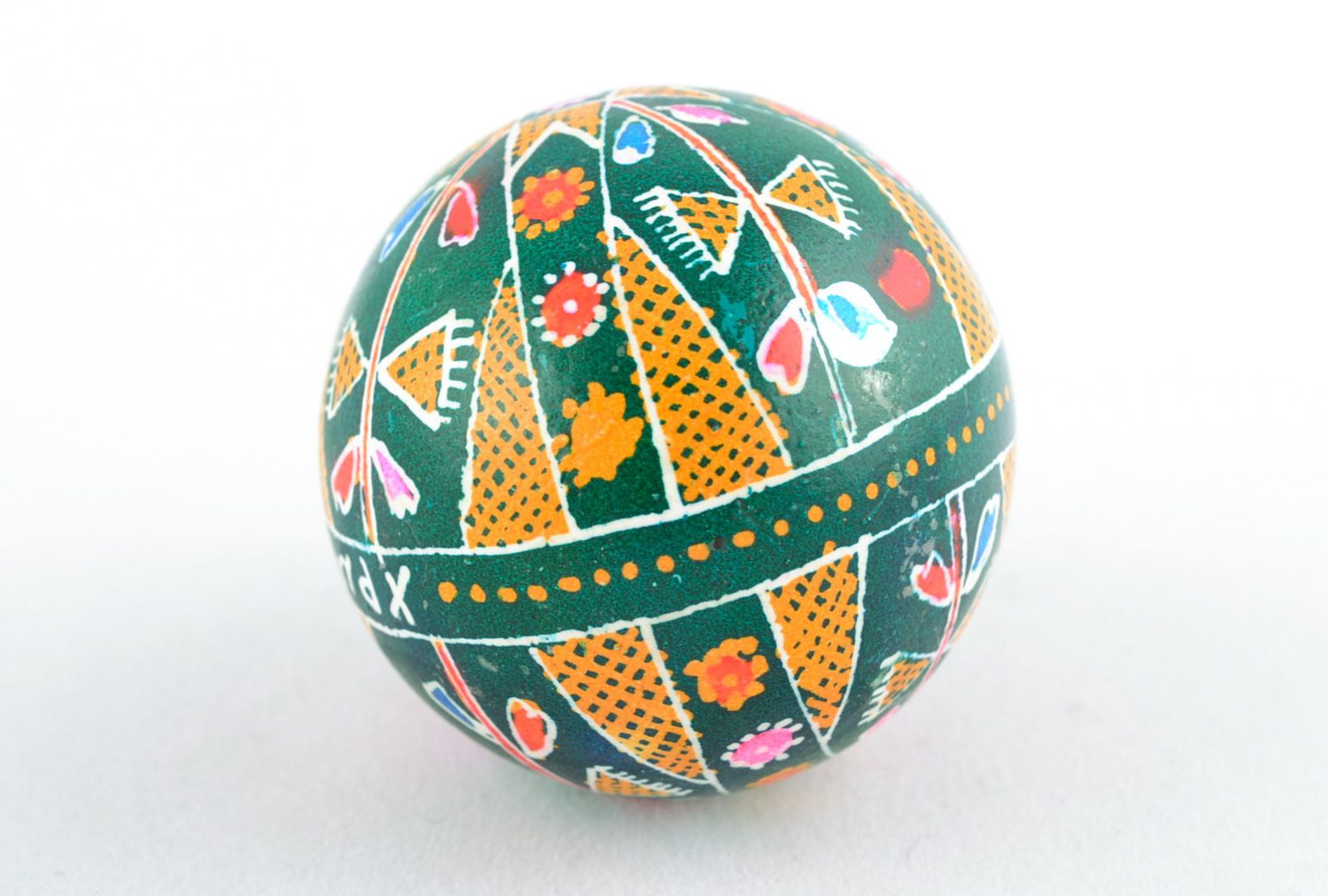 Homemade green Easter egg painted with hot wax photo 3
