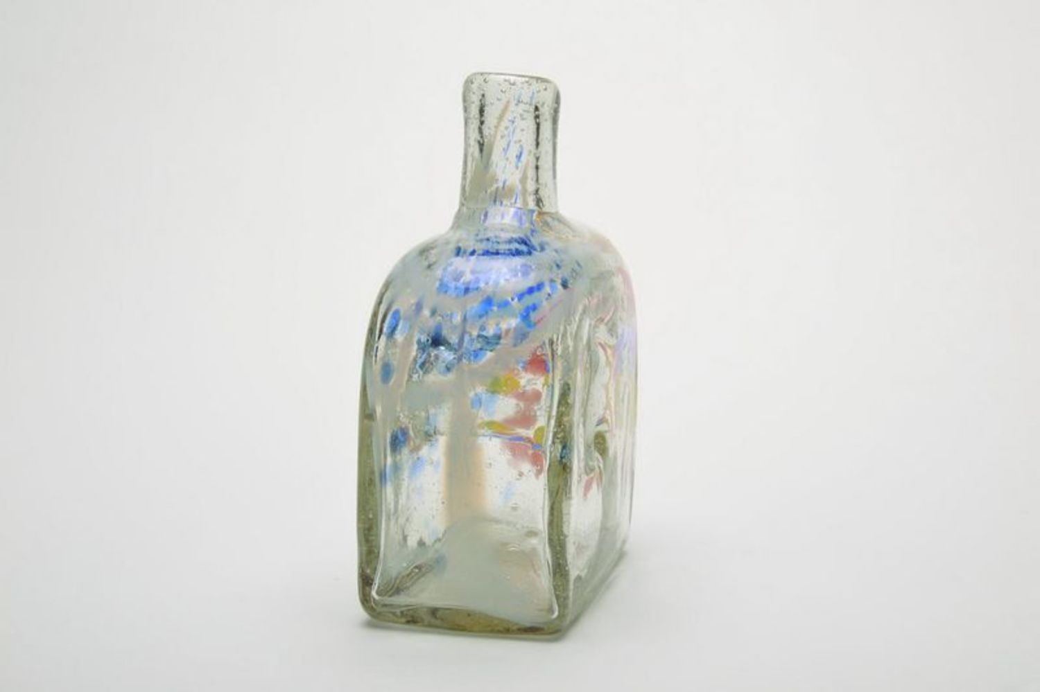 Bottle with colorful spots photo 4